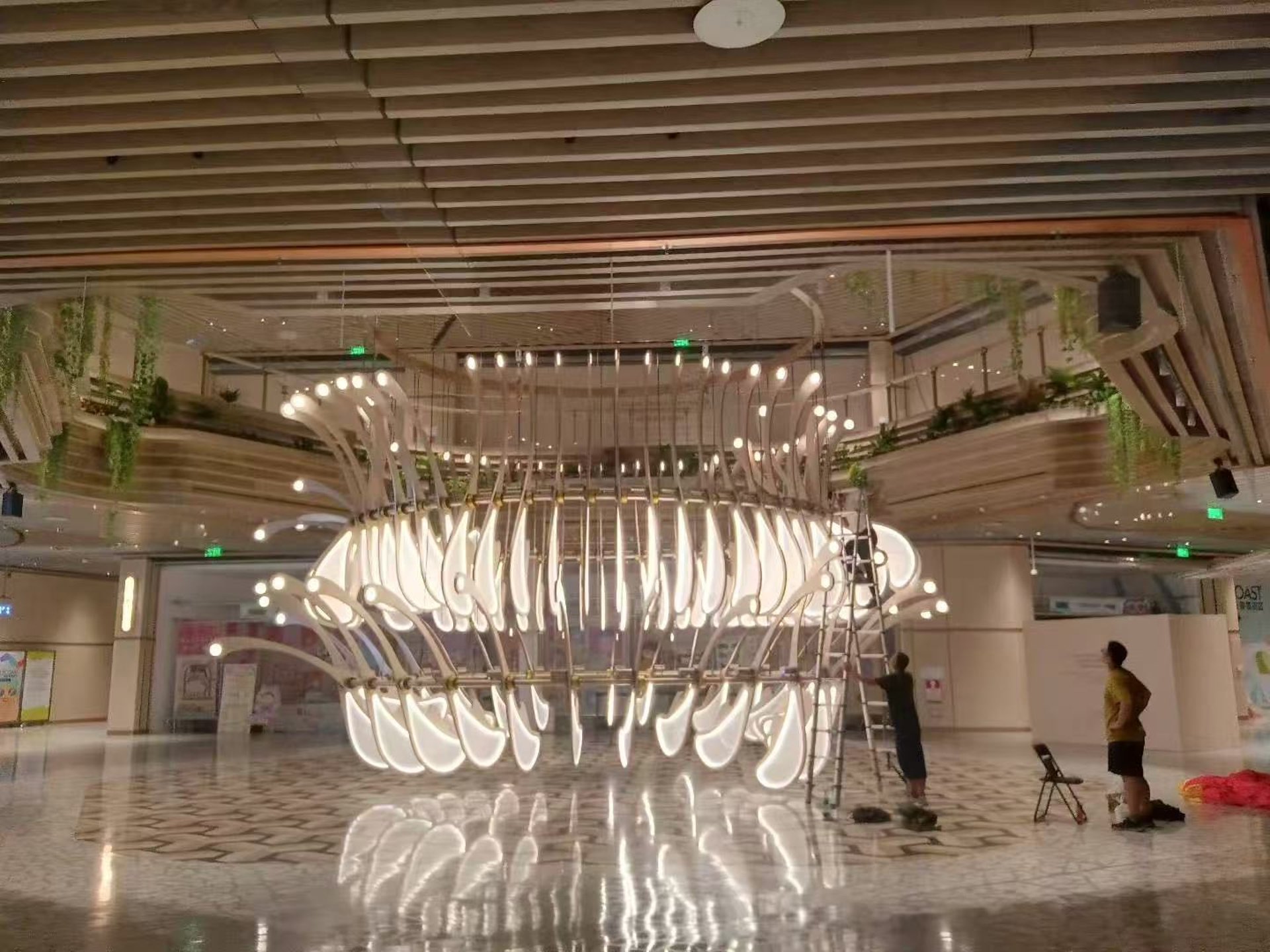 an abstract photo of a curved building with a blue sky in the background