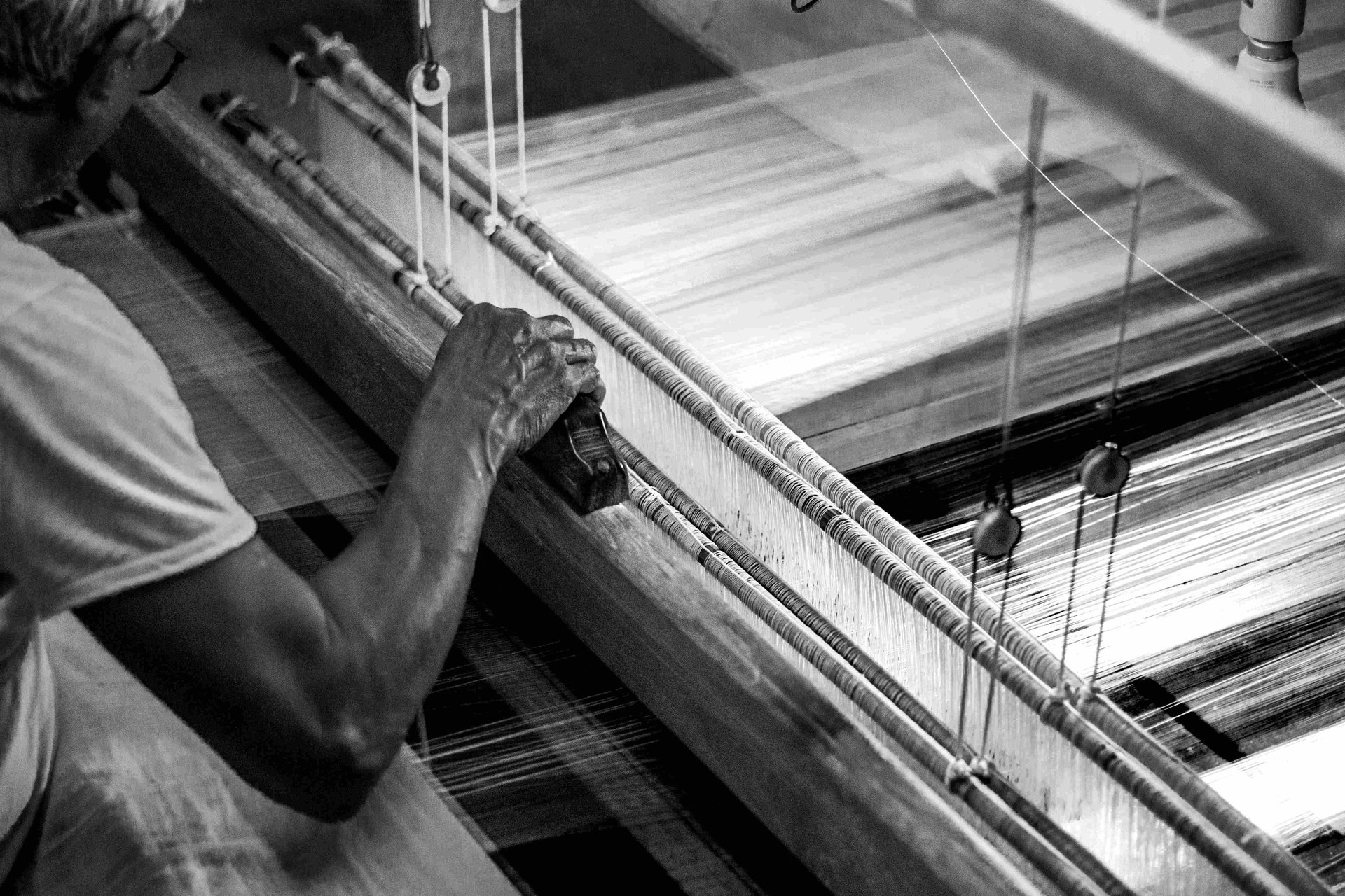 person wearing grey knit sweater