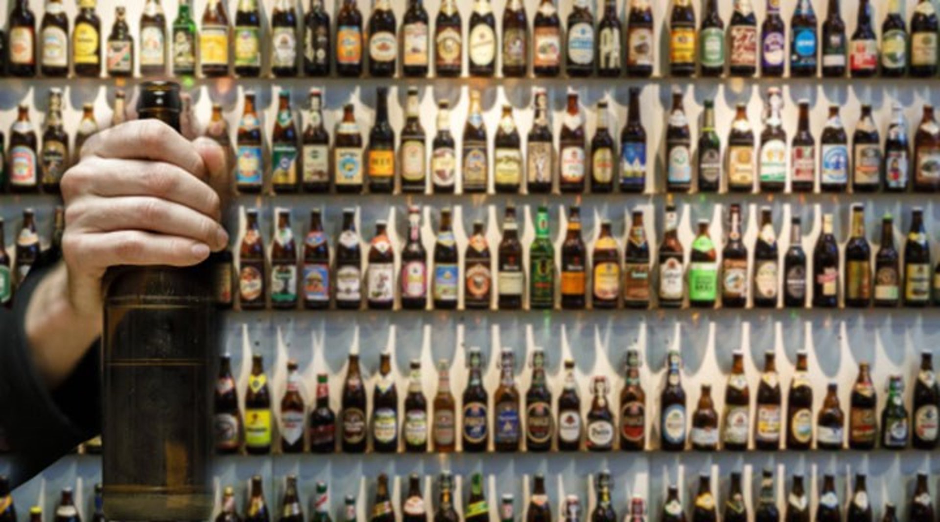 an abstract photo of a curved building with a blue sky in the background