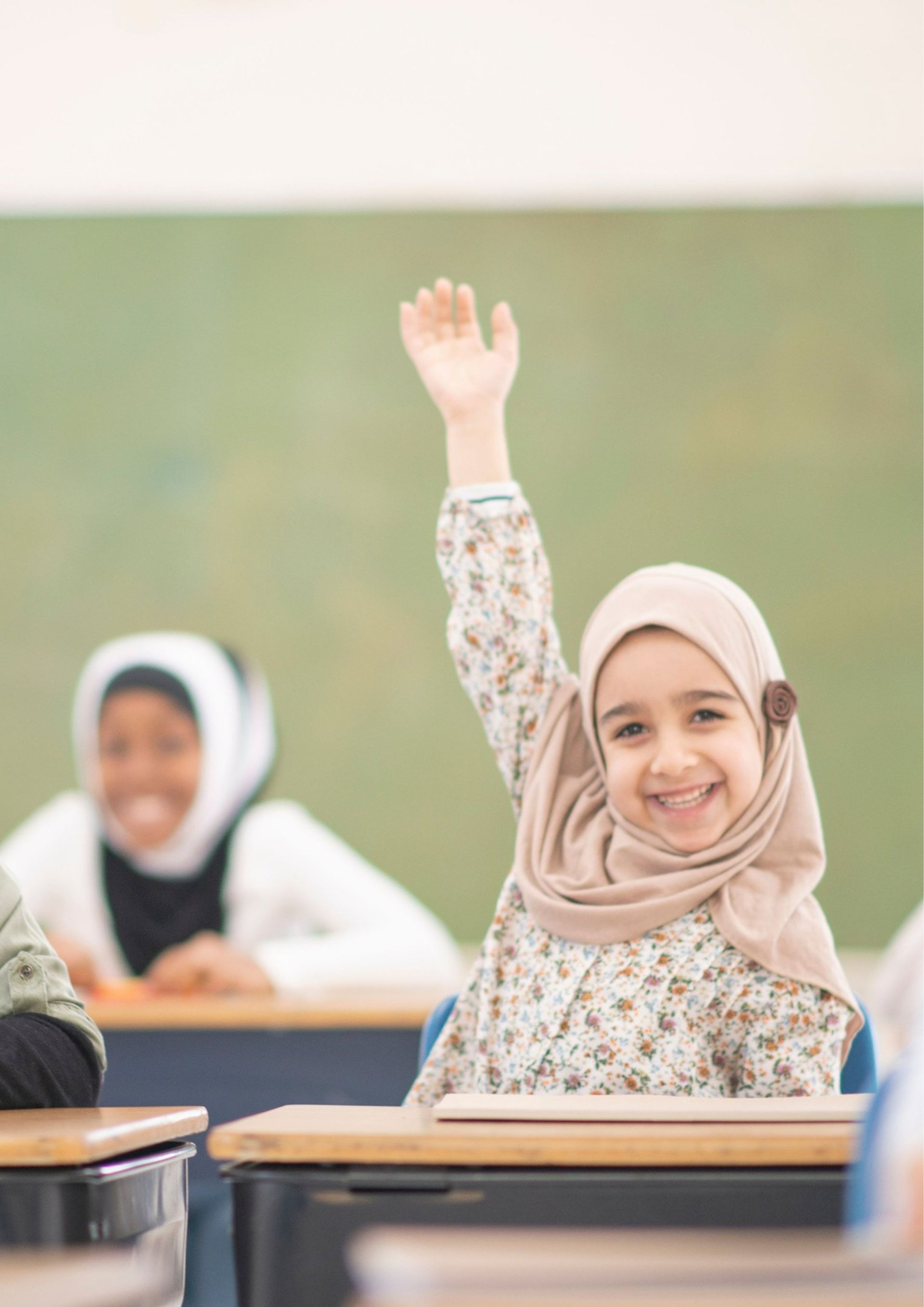 woman in white hijab smiling