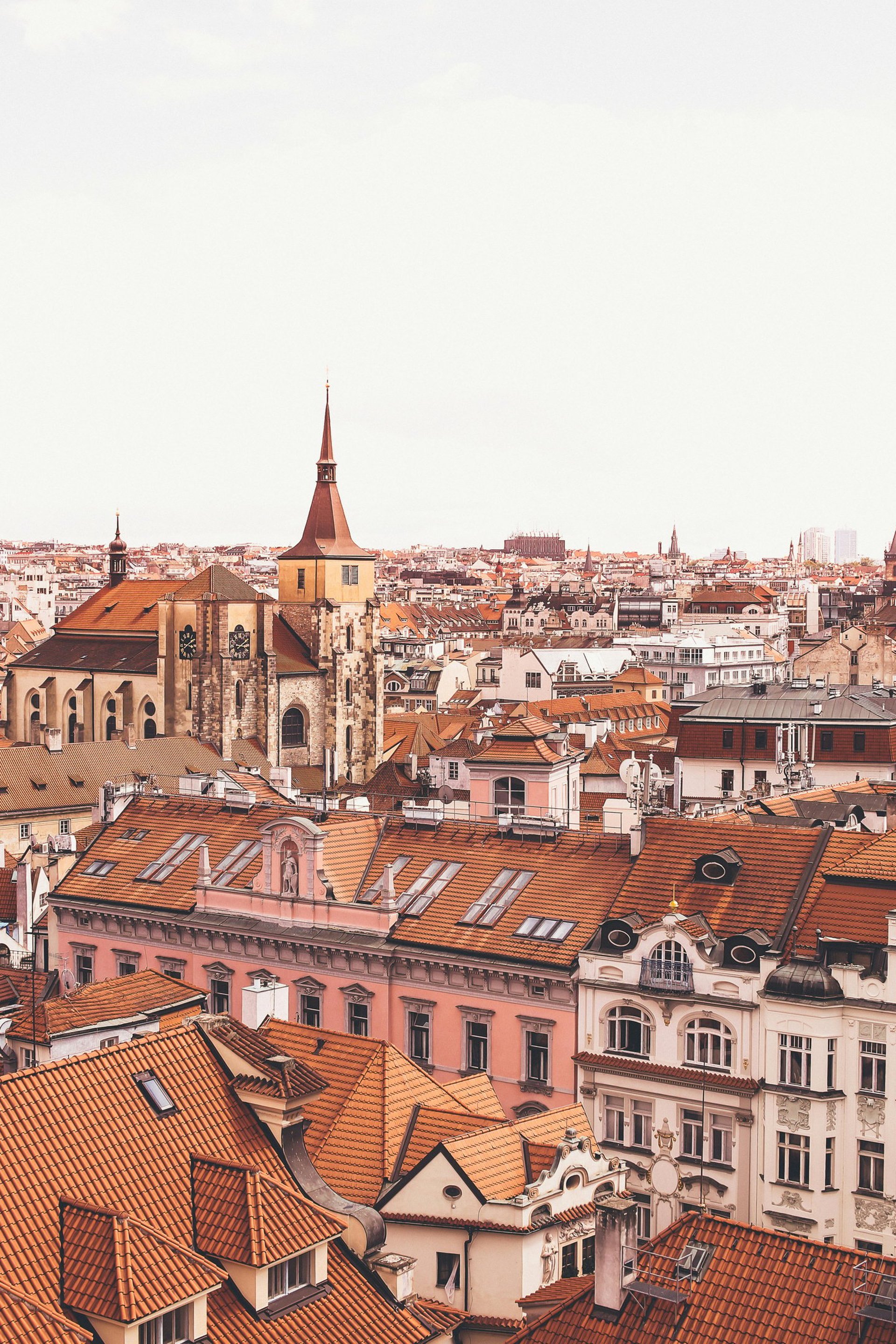 an abstract photo of a curved building with a blue sky in the background