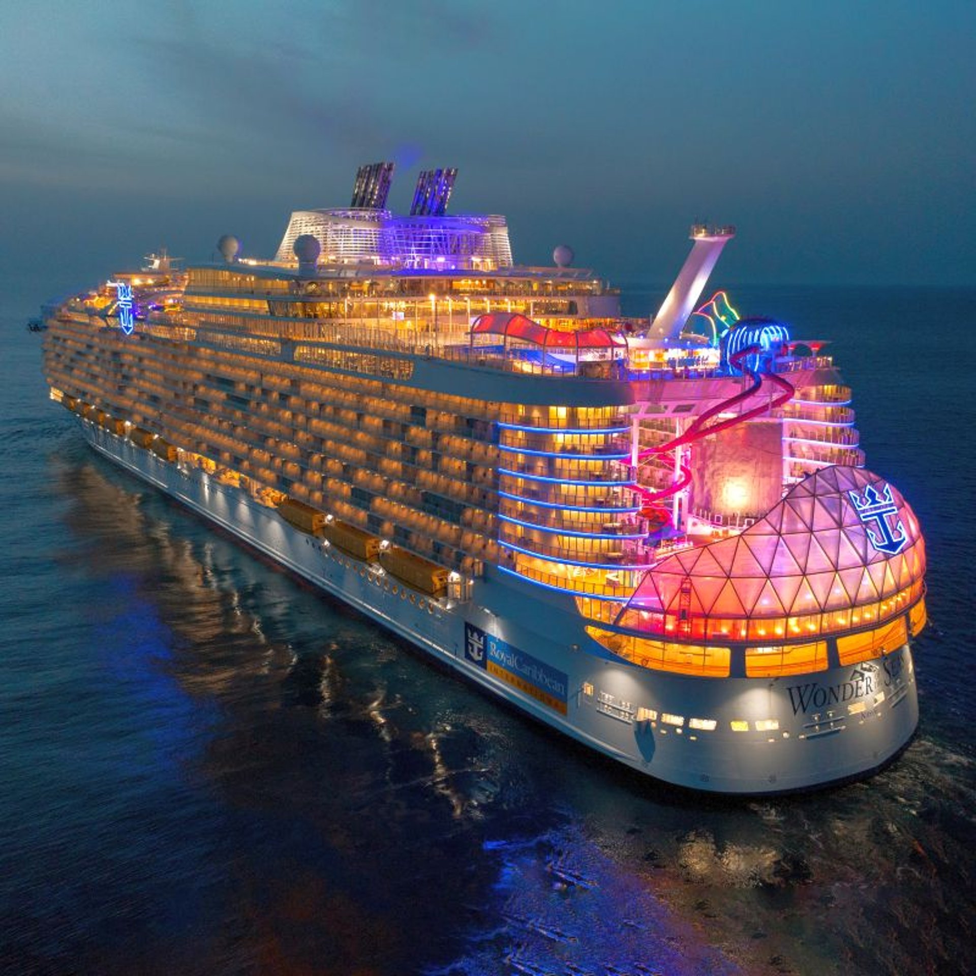 white ship on sea during sunset