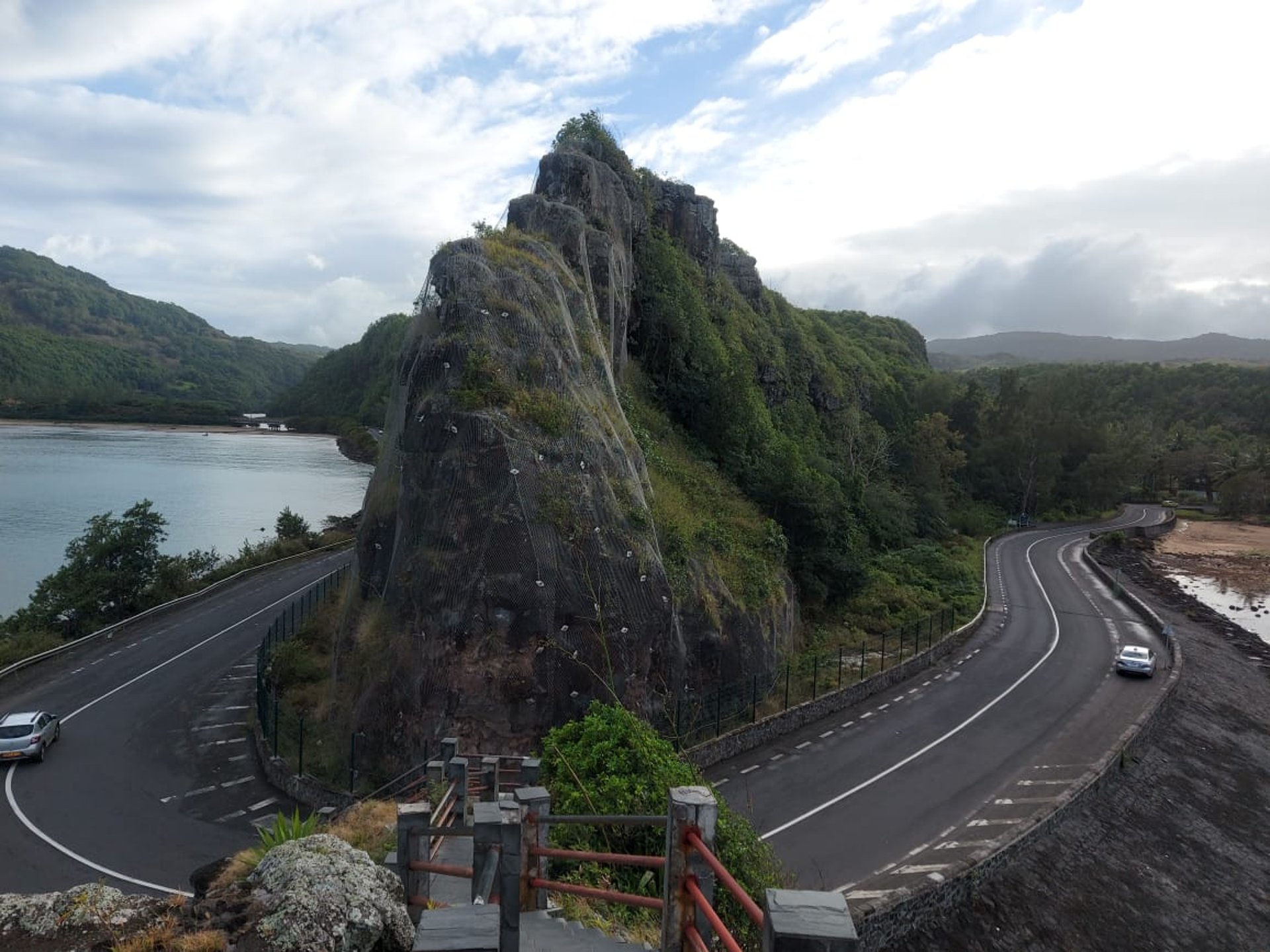 woman wearing yellow long-sleeved dress under white clouds and blue sky during daytime