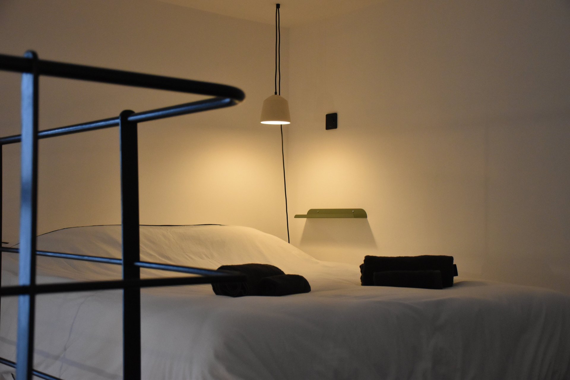 black and brown leather padded tub sofa