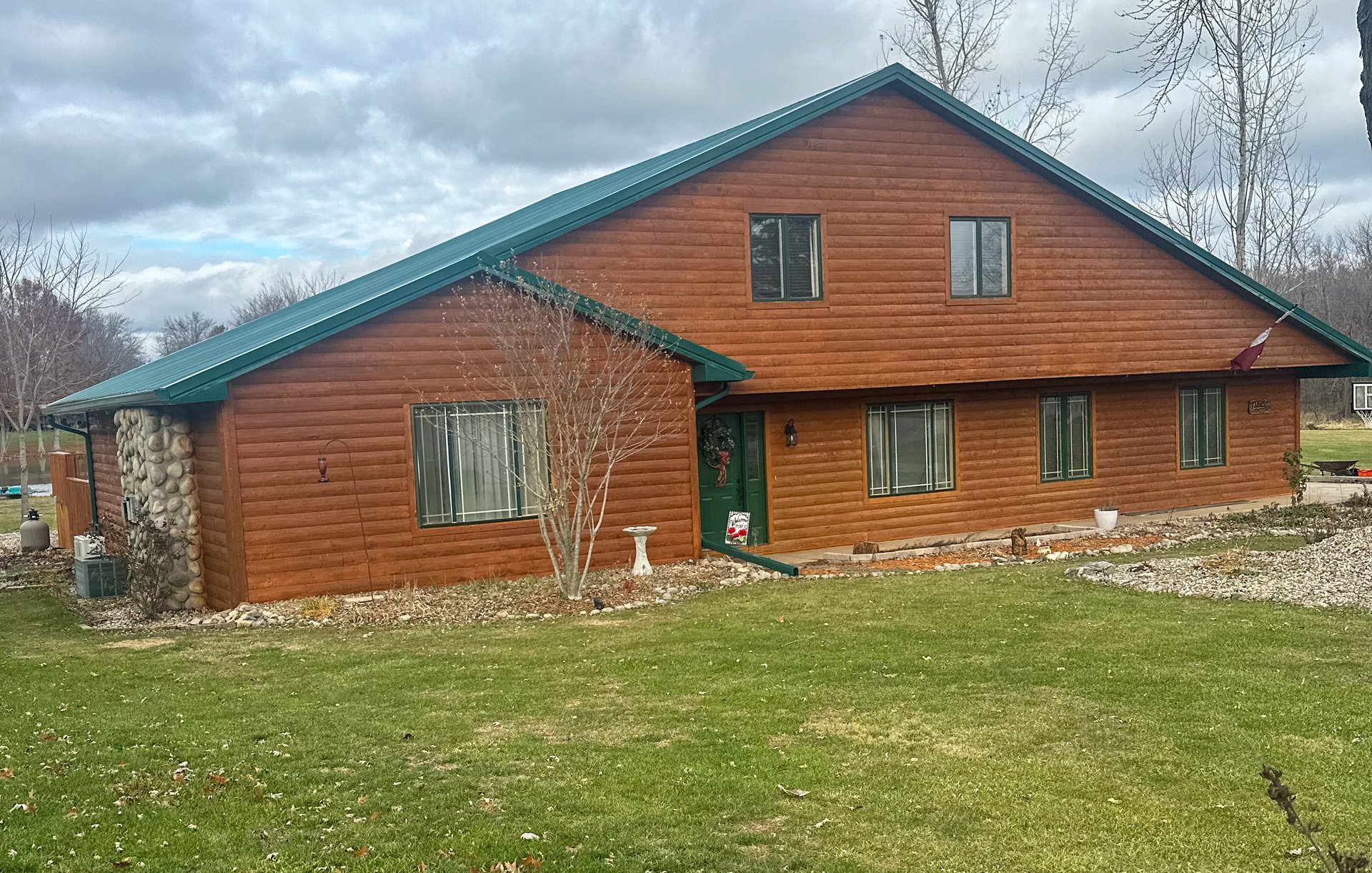black and brown leather padded tub sofa