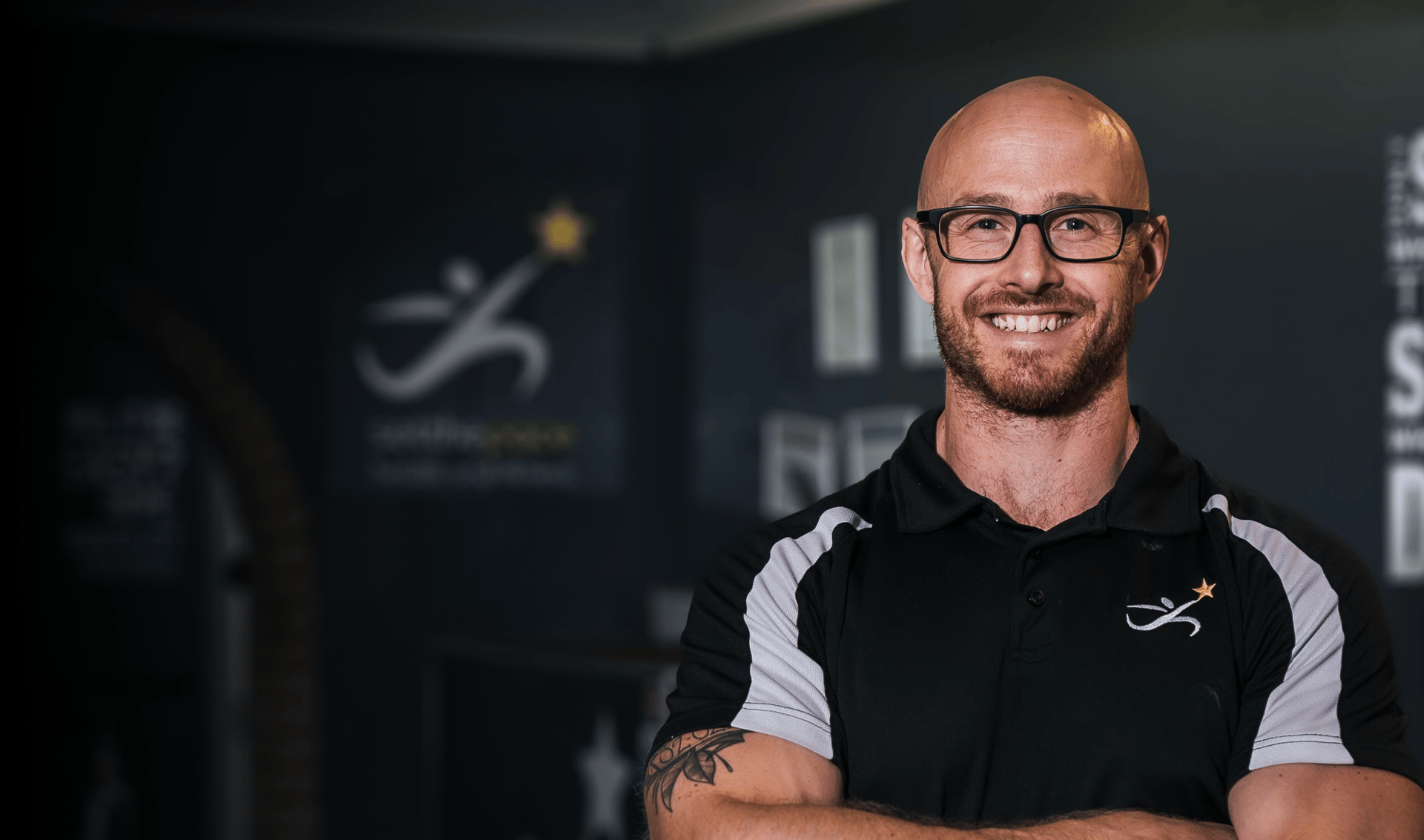 an abstract photo of a curved building with a blue sky in the background