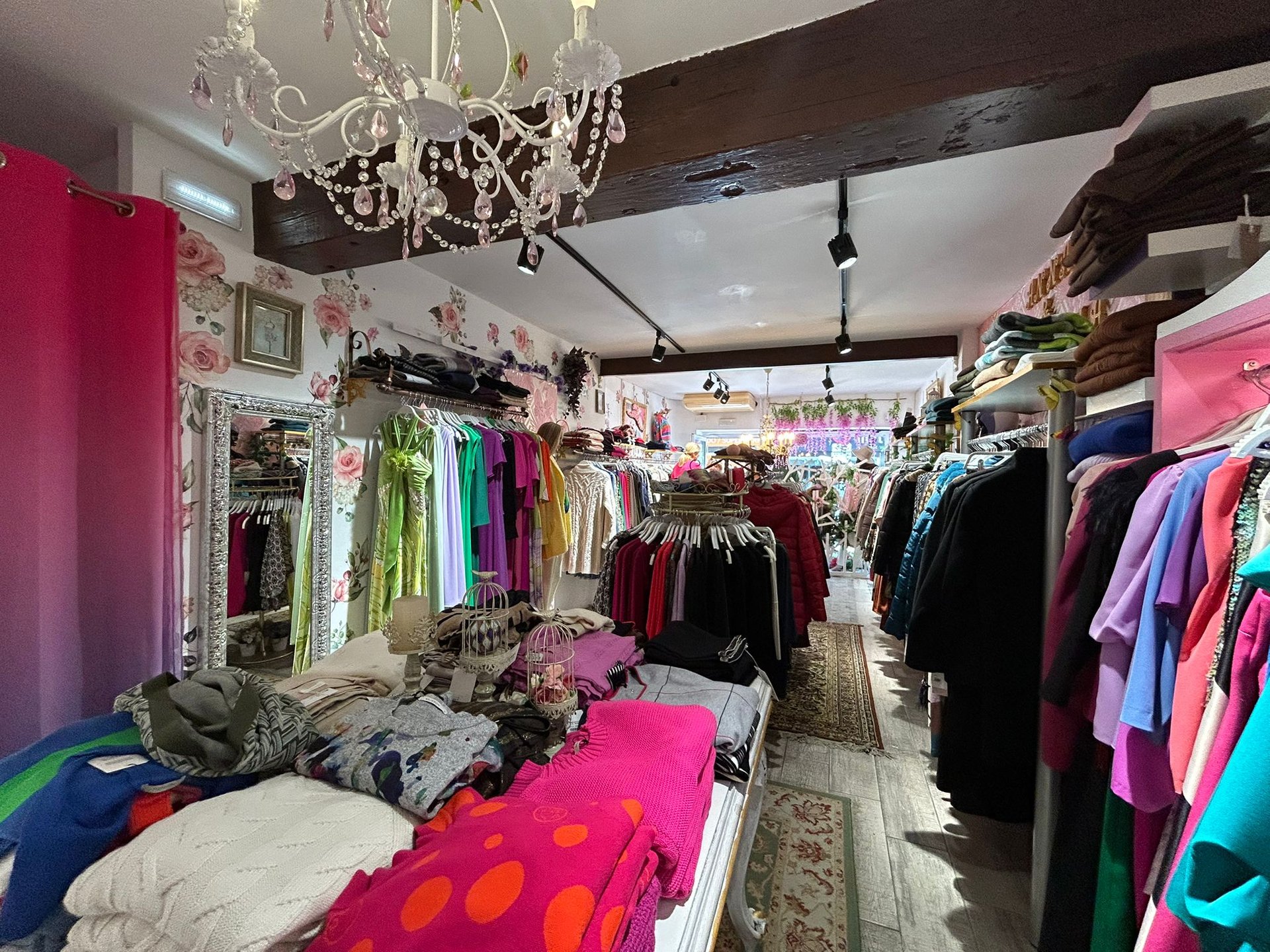 woman wearing yellow long-sleeved dress under white clouds and blue sky during daytime