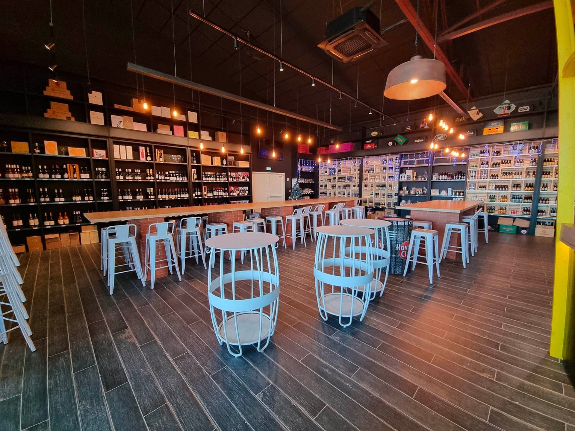 an abstract photo of a curved building with a blue sky in the background