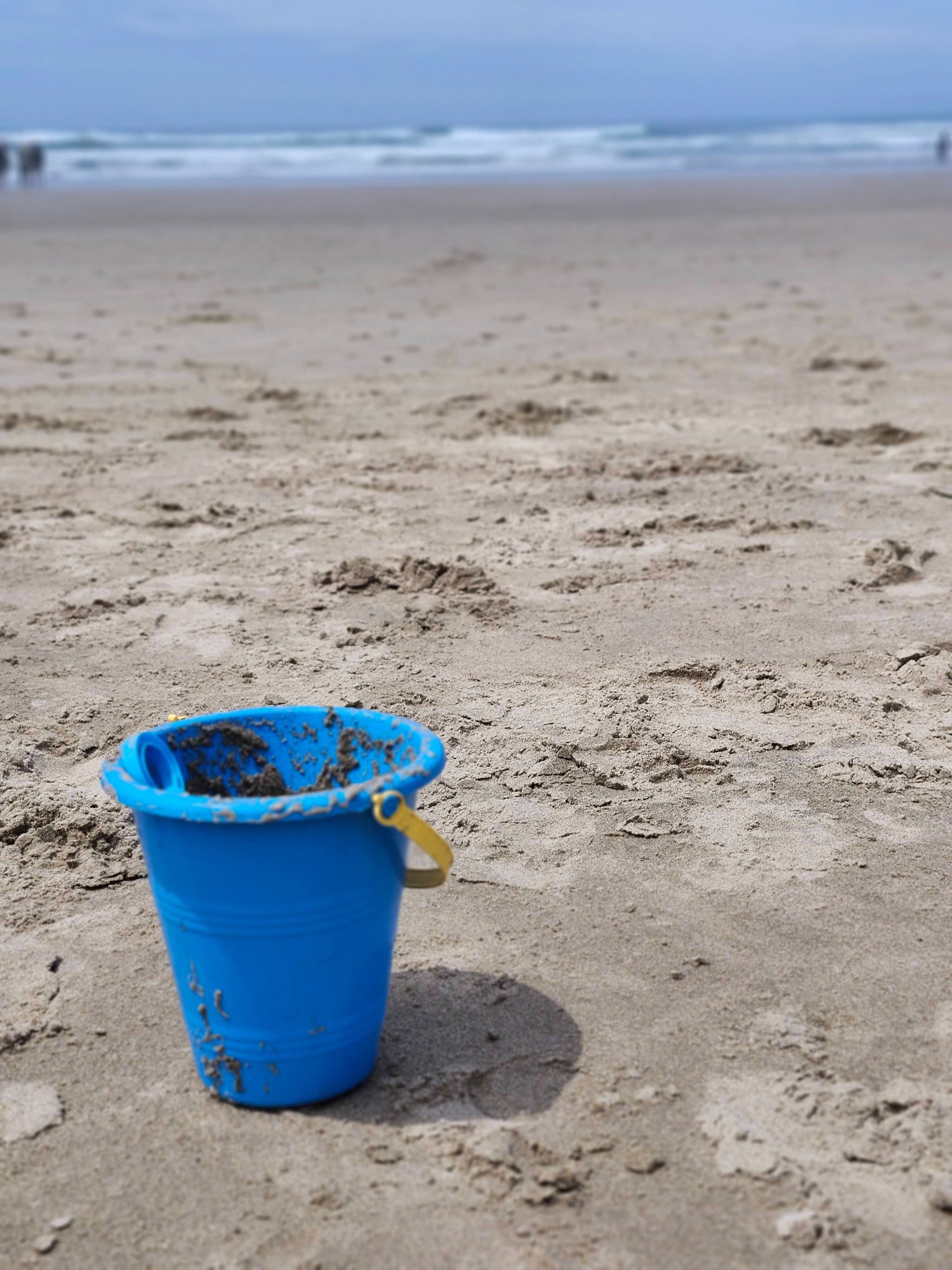 An empty classroom with a chalkboard on the wall