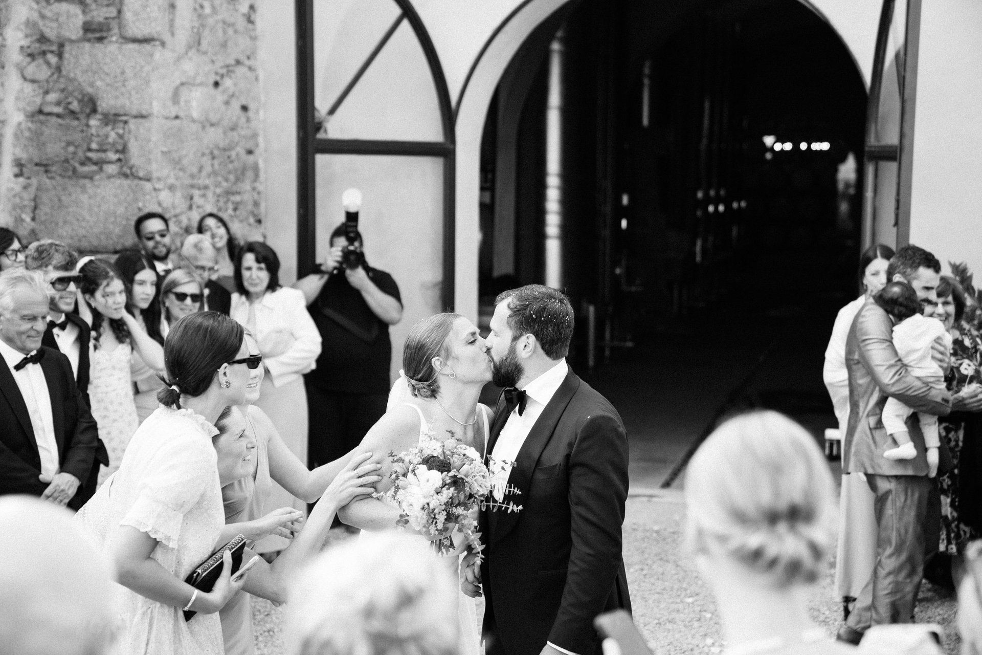 an abstract photo of a curved building with a blue sky in the background