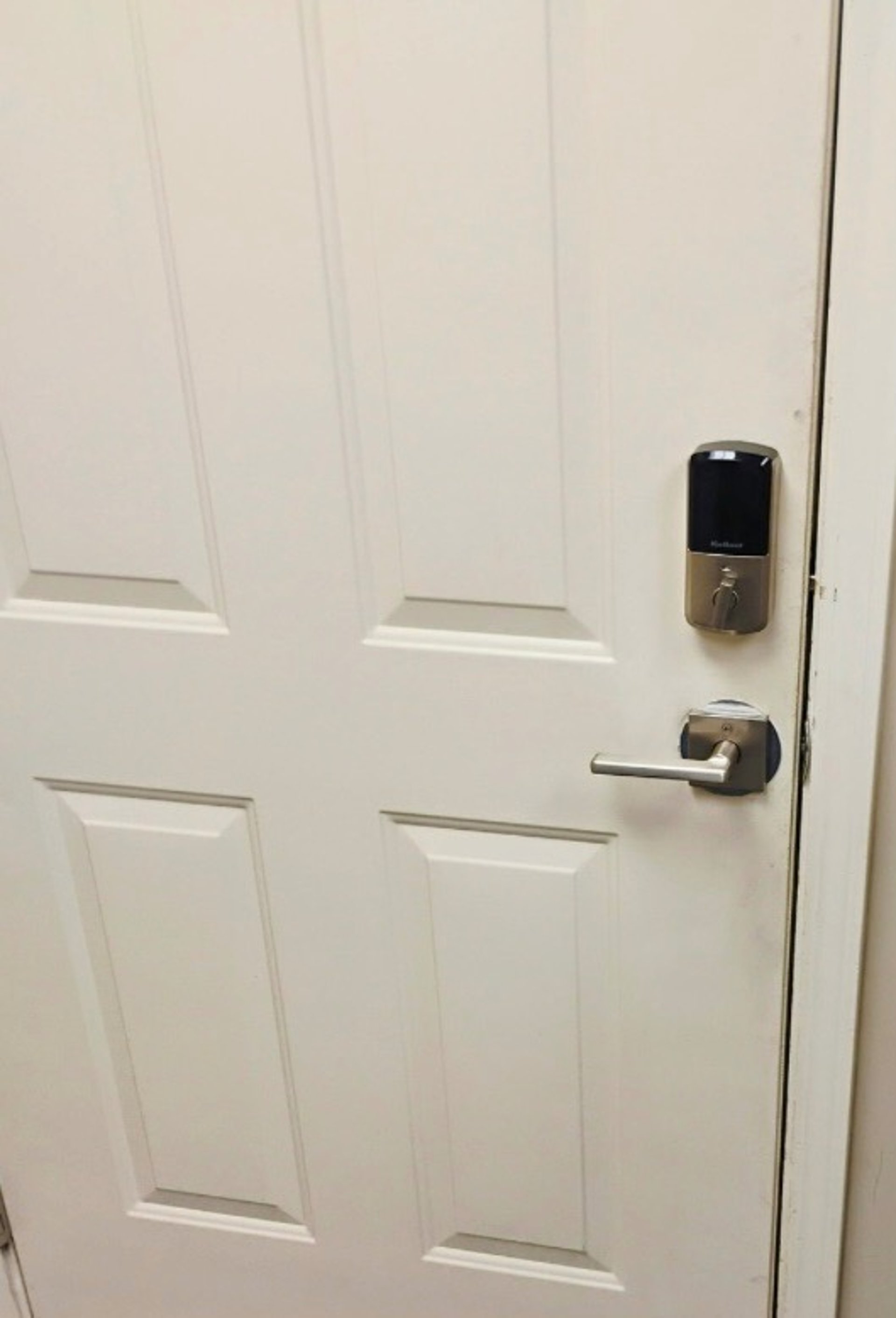 Commercial white door with access control security lock