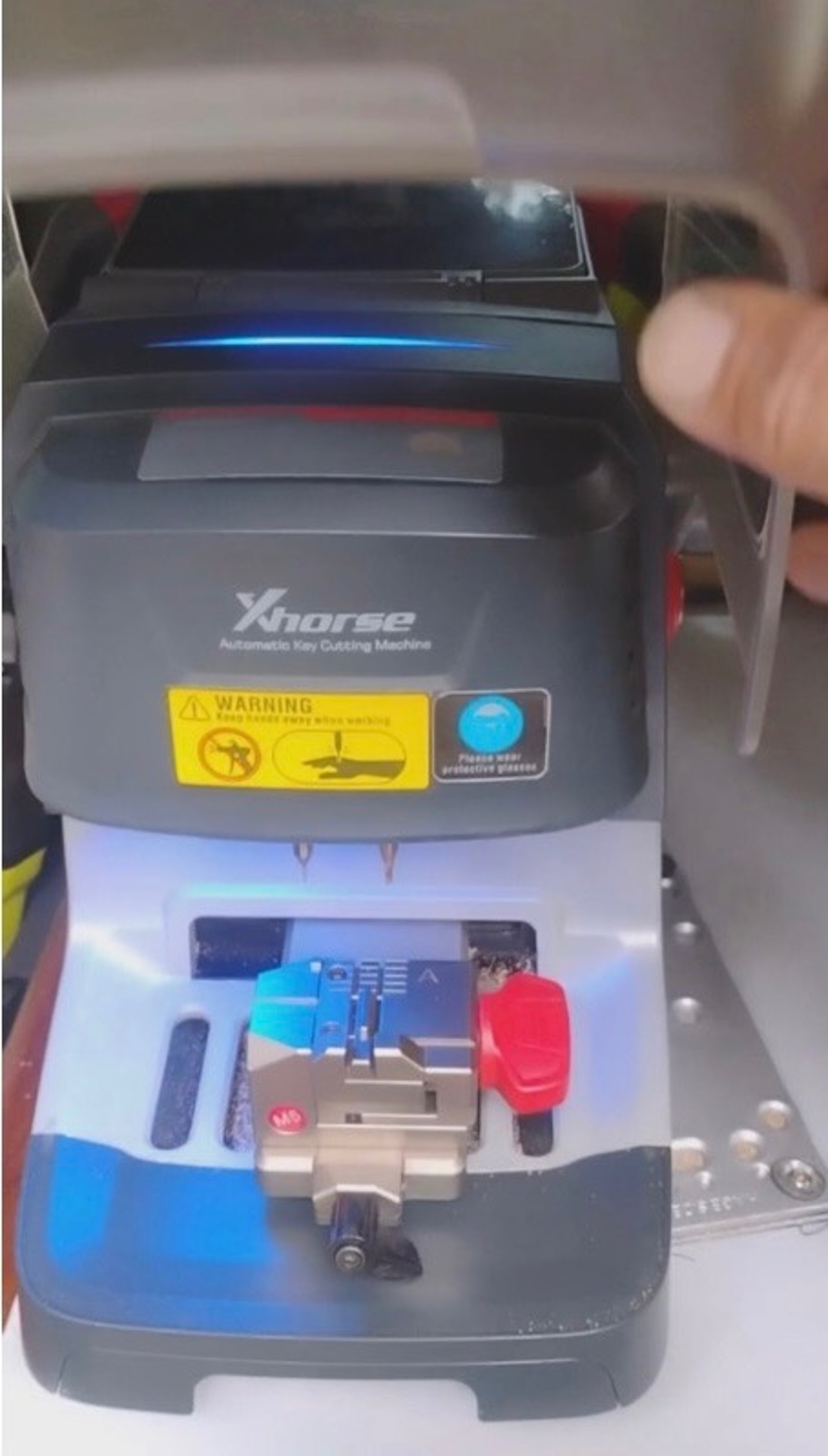 Locksmith duplicating machine representing careers at Asheville Locksmith Now