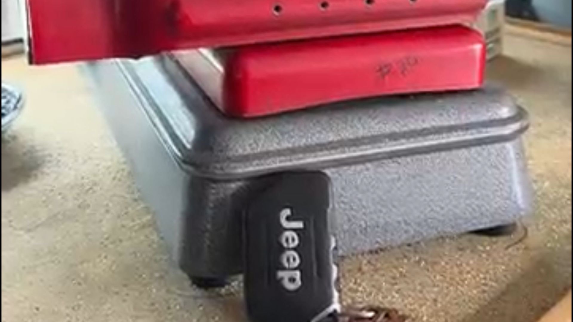 Auto locksmith in Asheville NC cutting Jeep car key