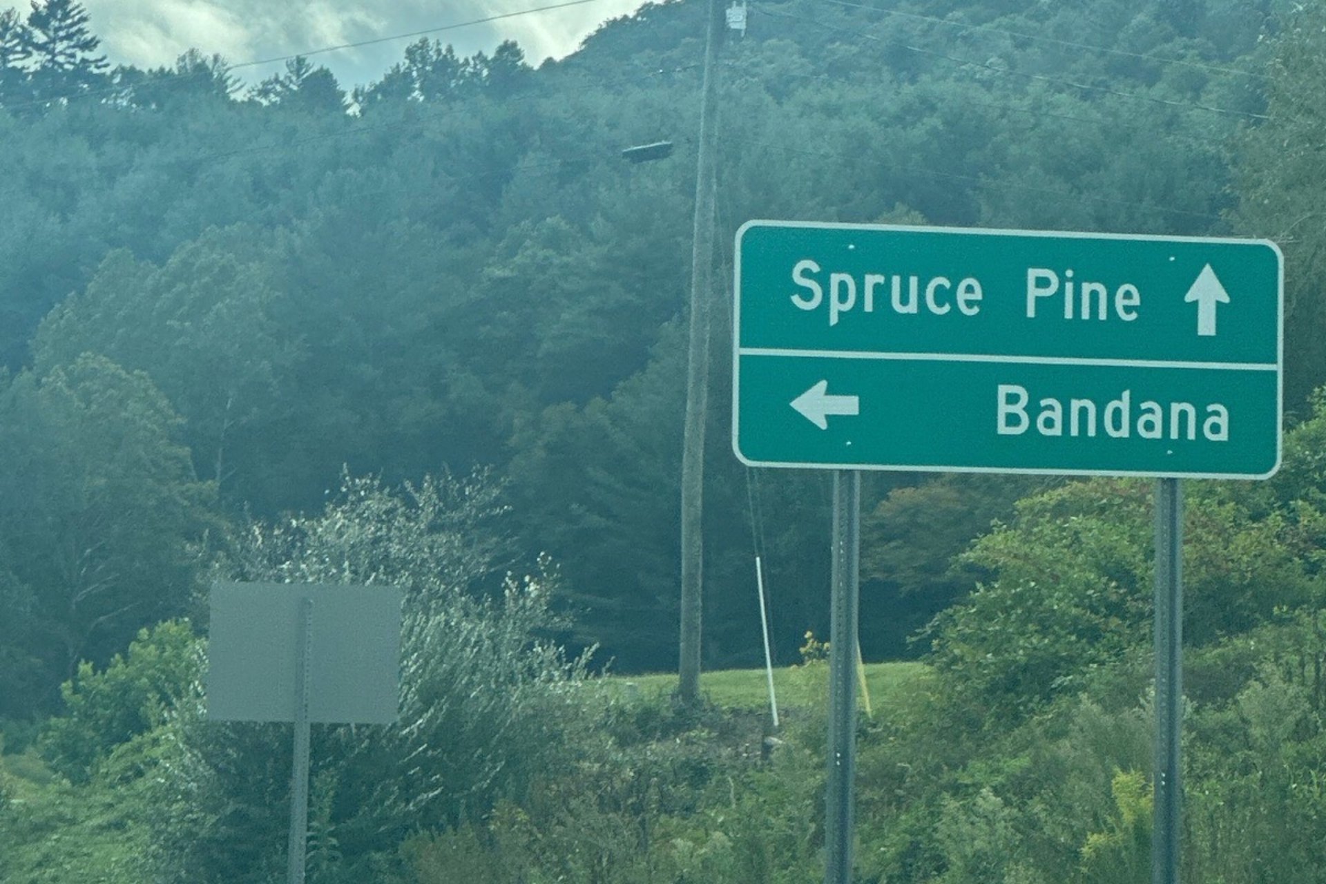 Welcome sign for Spruce Pine, NC, highlighting Asheville Locksmith Now serves available in the area