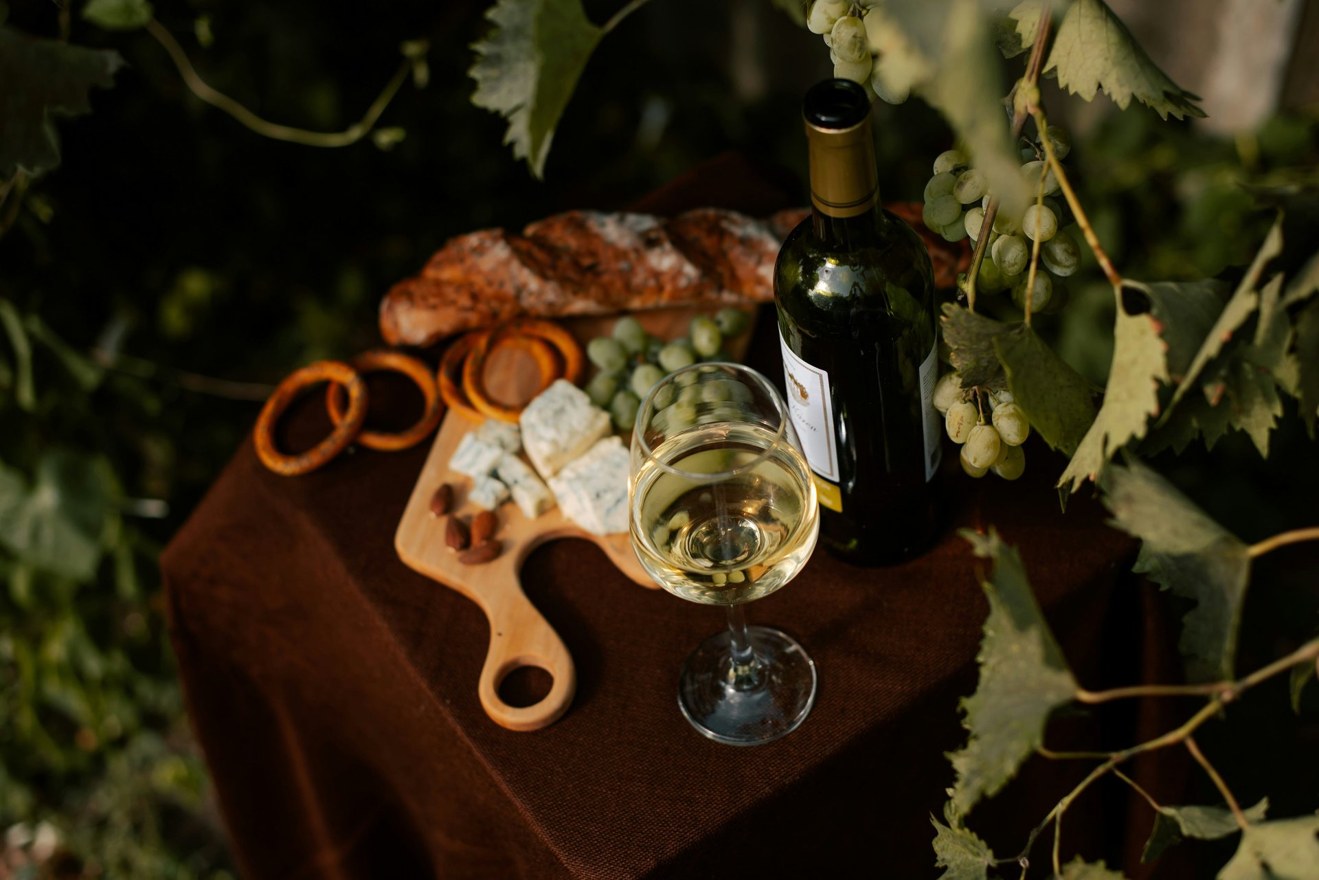 white_wine_with_cheese_grapes_baguette