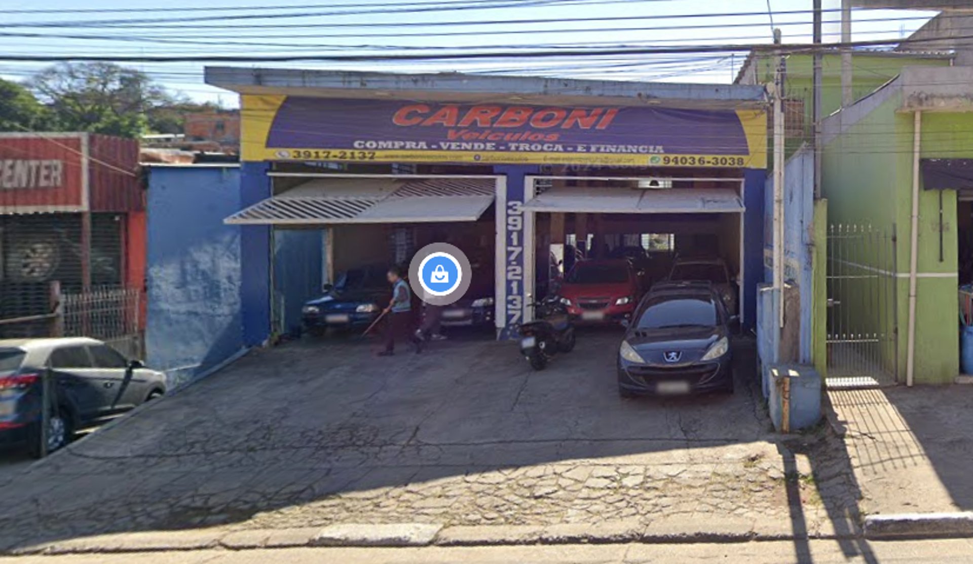 person wearing grey knit sweater