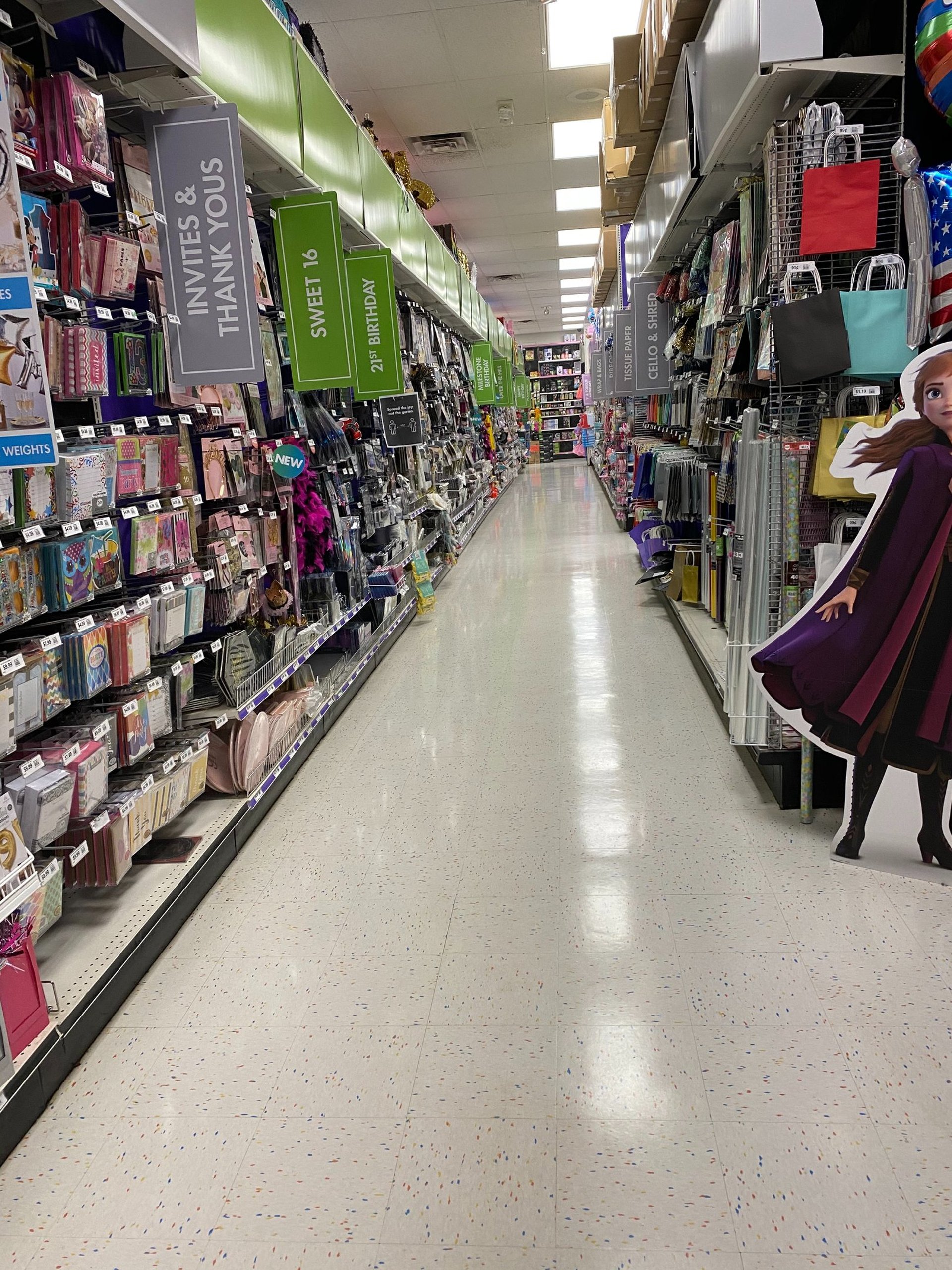 Large retail store floor cleaning tile flooring strip and wax