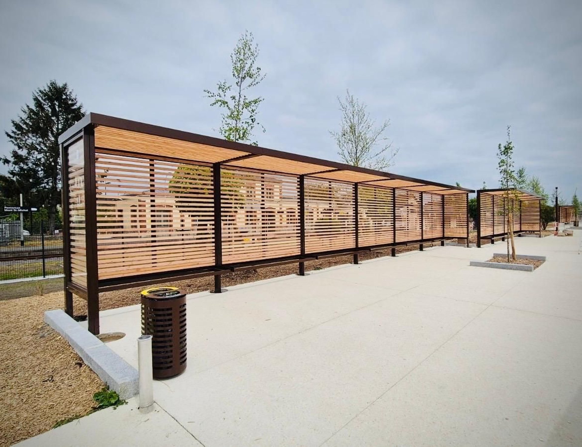 woman wearing yellow long-sleeved dress under white clouds and blue sky during daytime