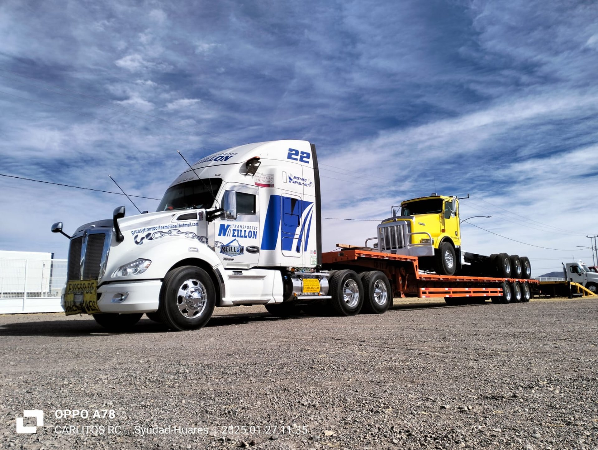 woman wearing yellow long-sleeved dress under white clouds and blue sky during daytime