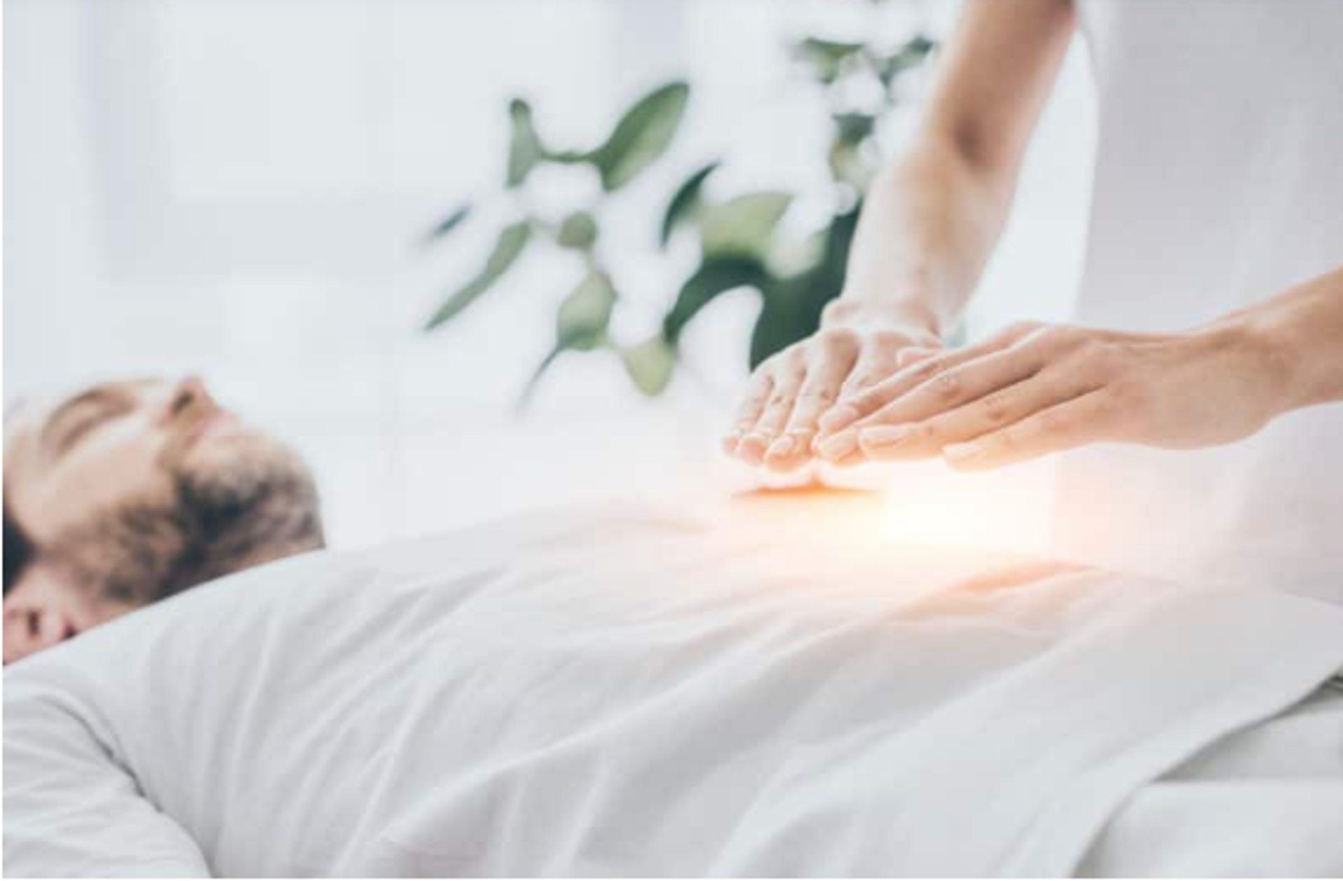 person holding string lights