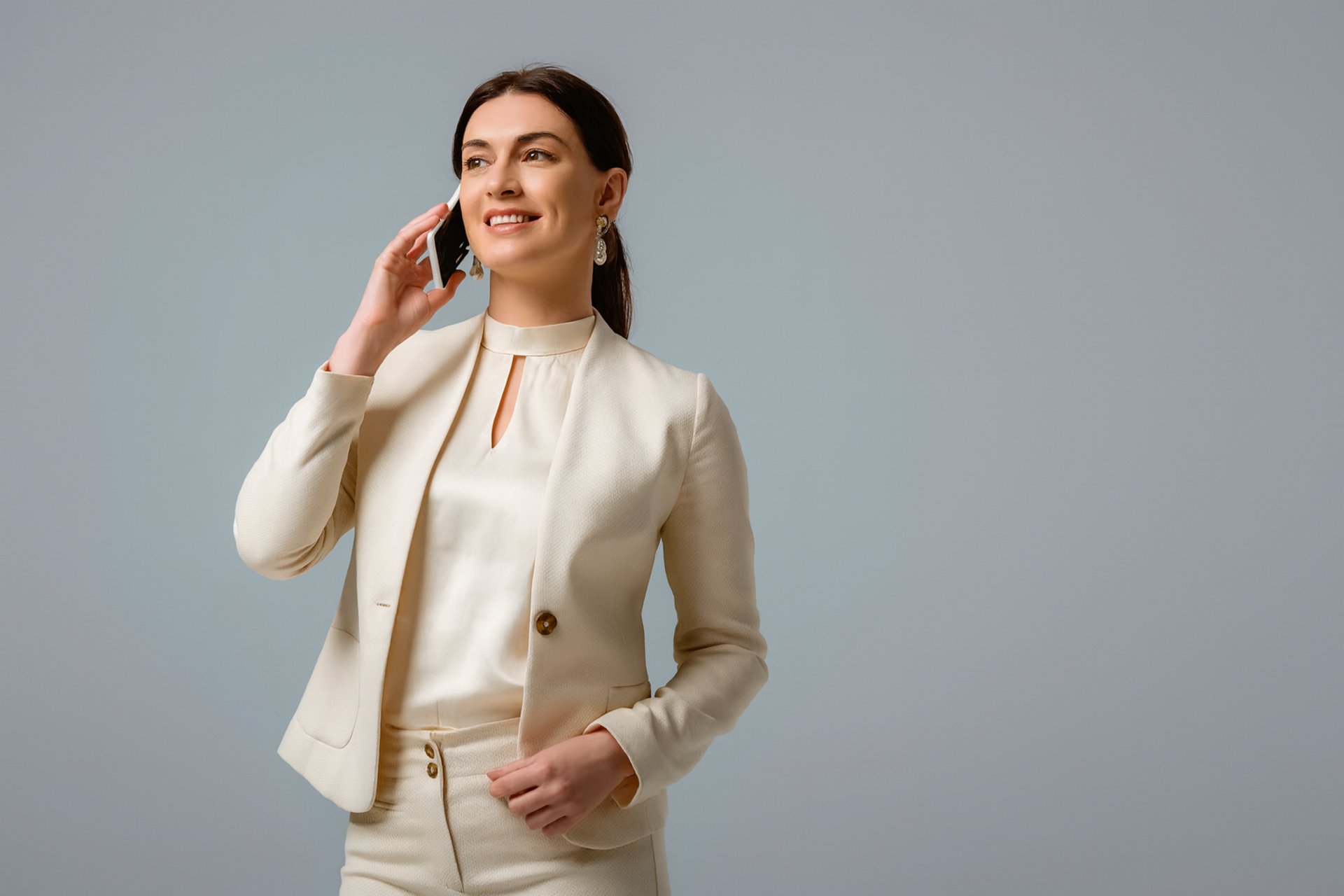 person holding white Android smartphone in white shirt