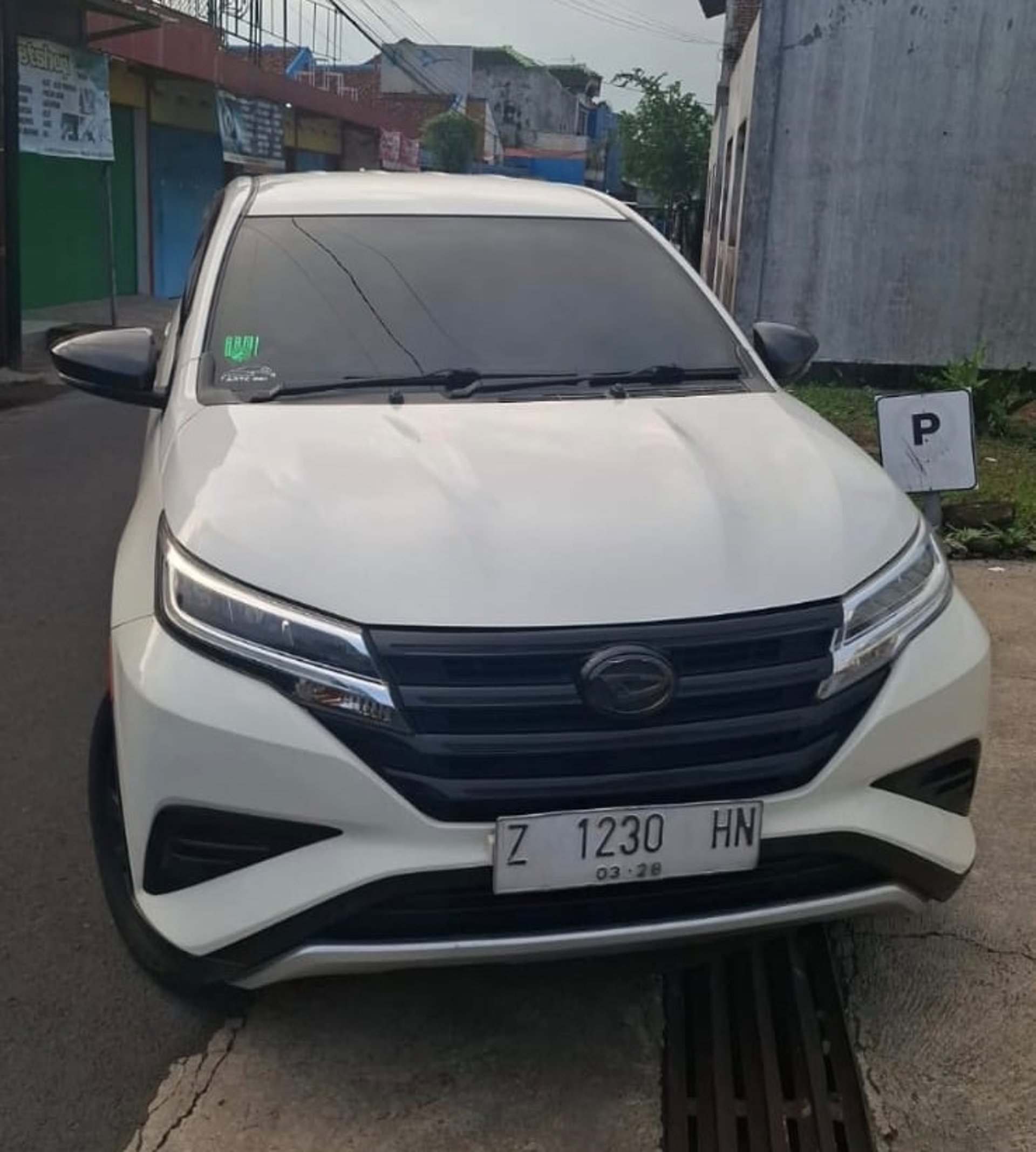 woman wearing yellow long-sleeved dress under white clouds and blue sky during daytime