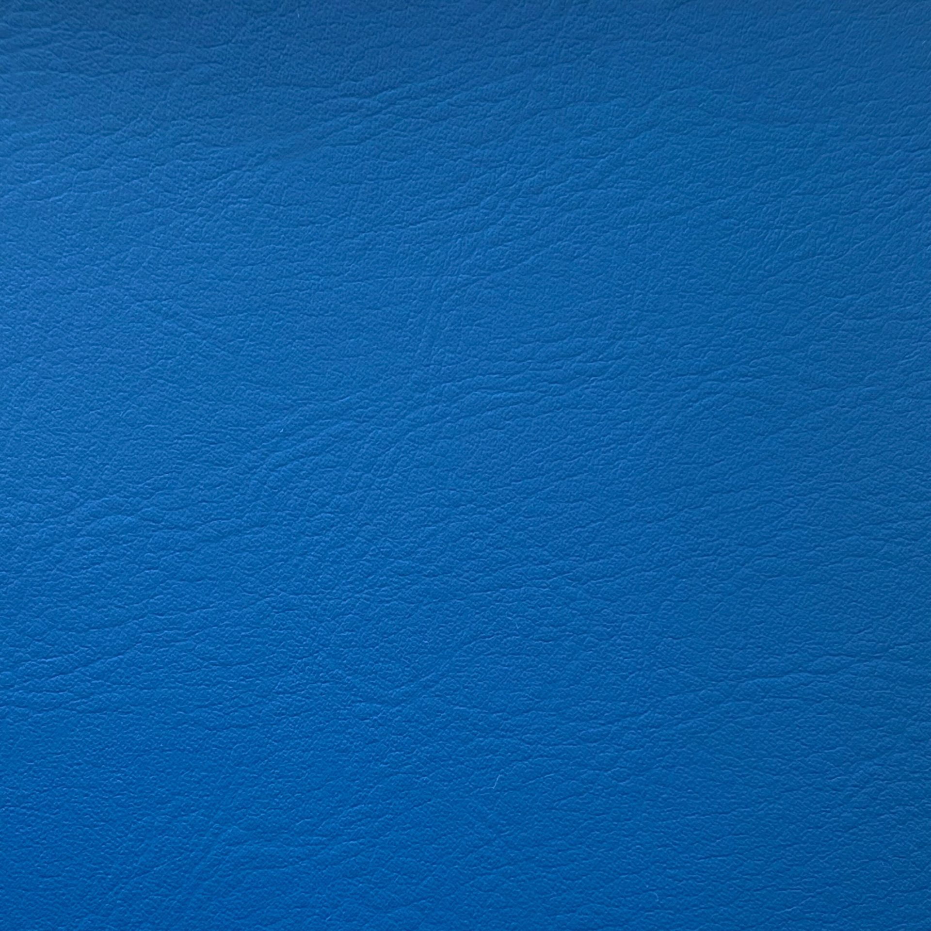 A solid, bright blue background is shown.