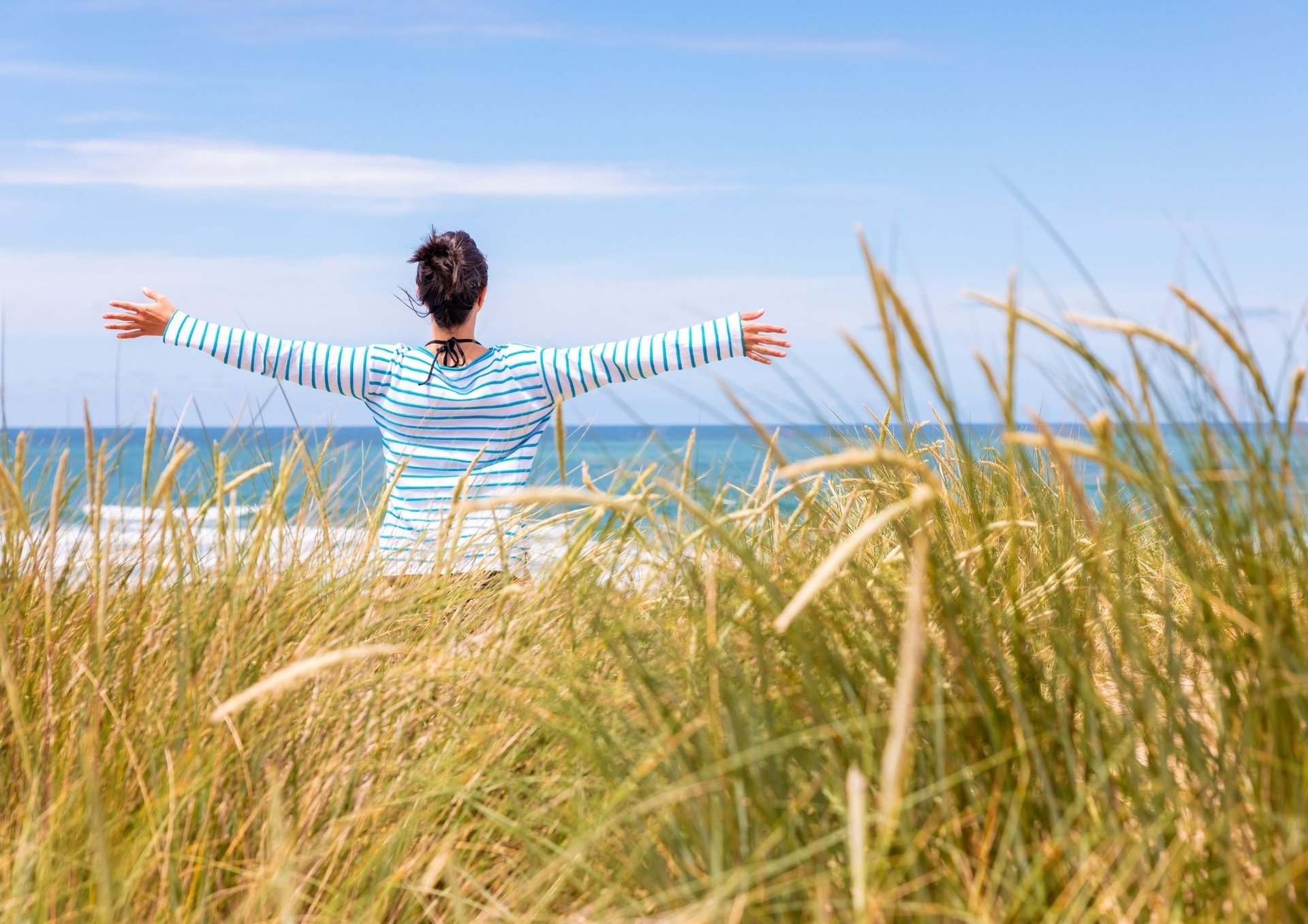 woman doing yoga meditation on brown parquet flooring