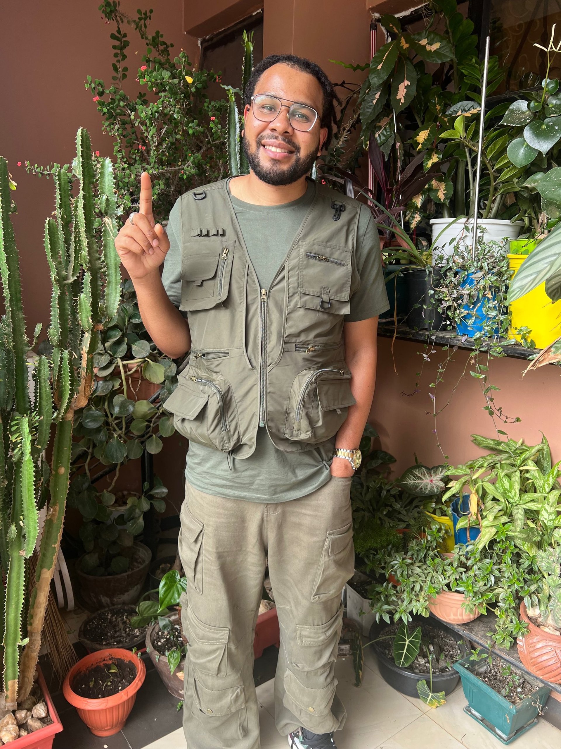 woman holding dried flower