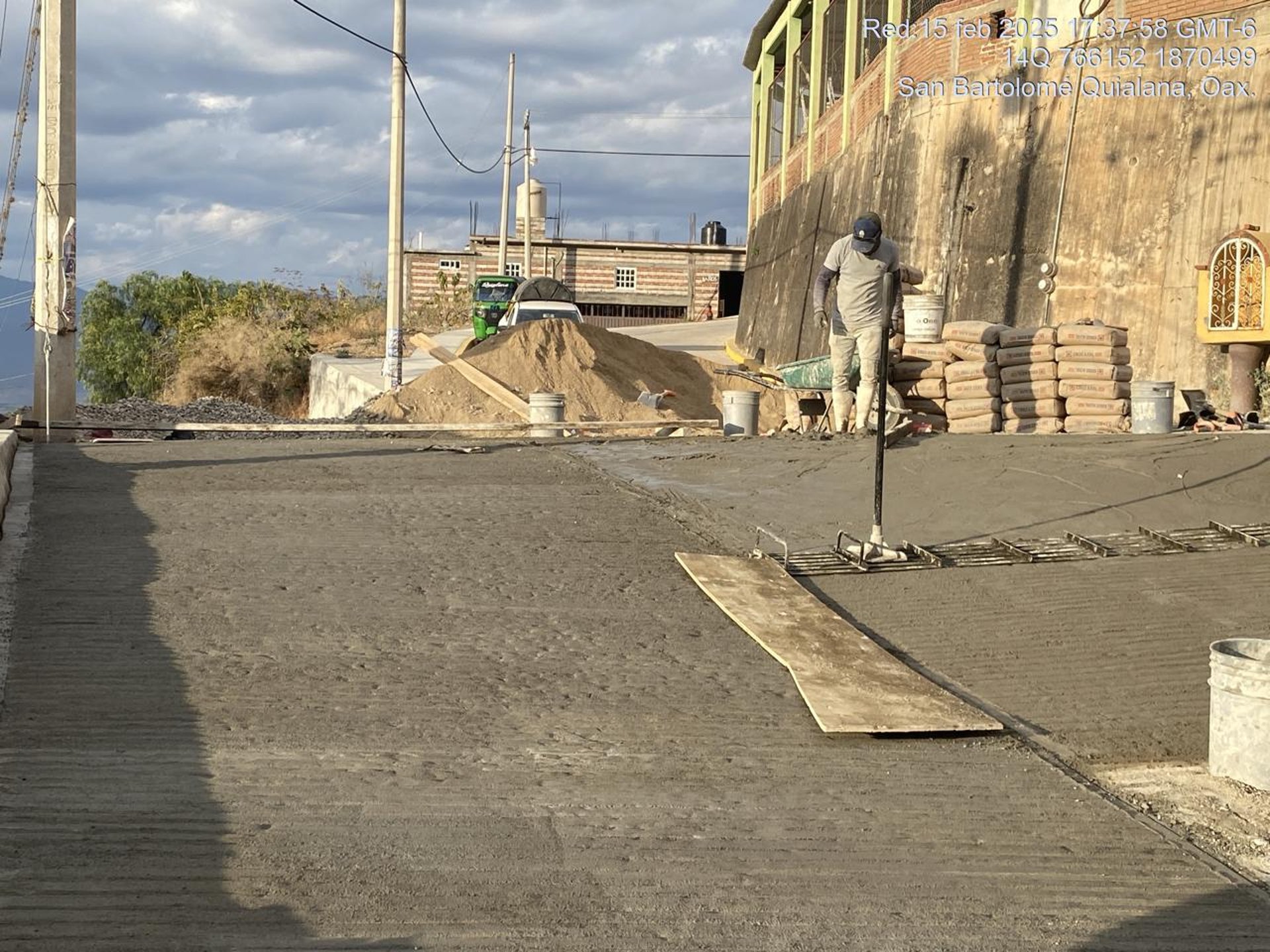 person walking on concrete pavement