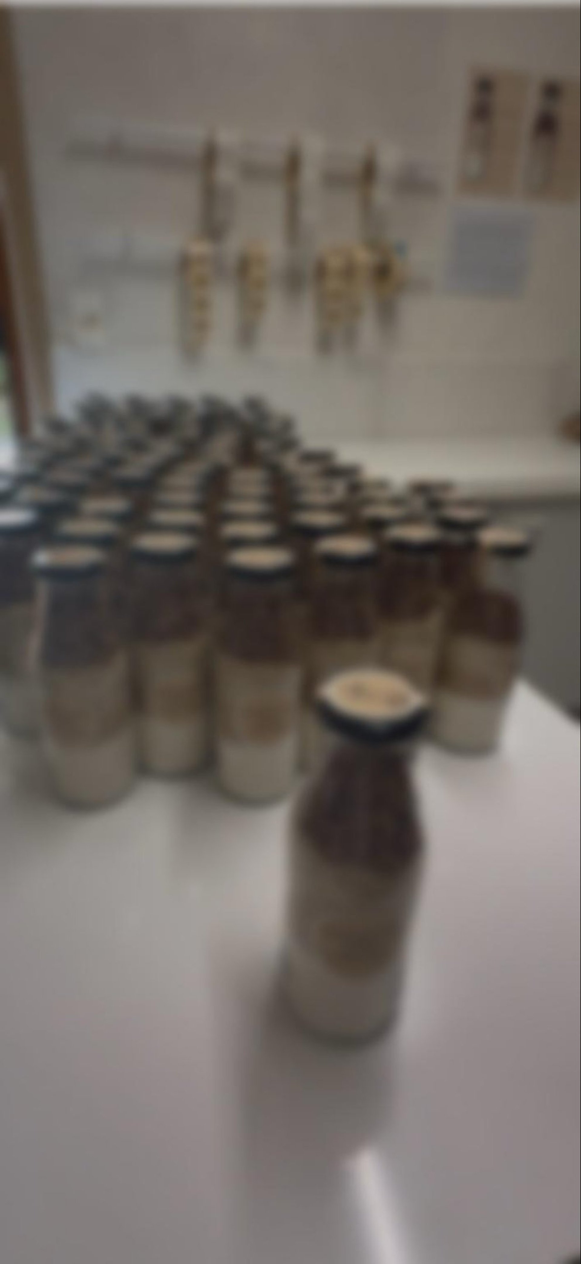 an abstract photo of a curved building with a blue sky in the background