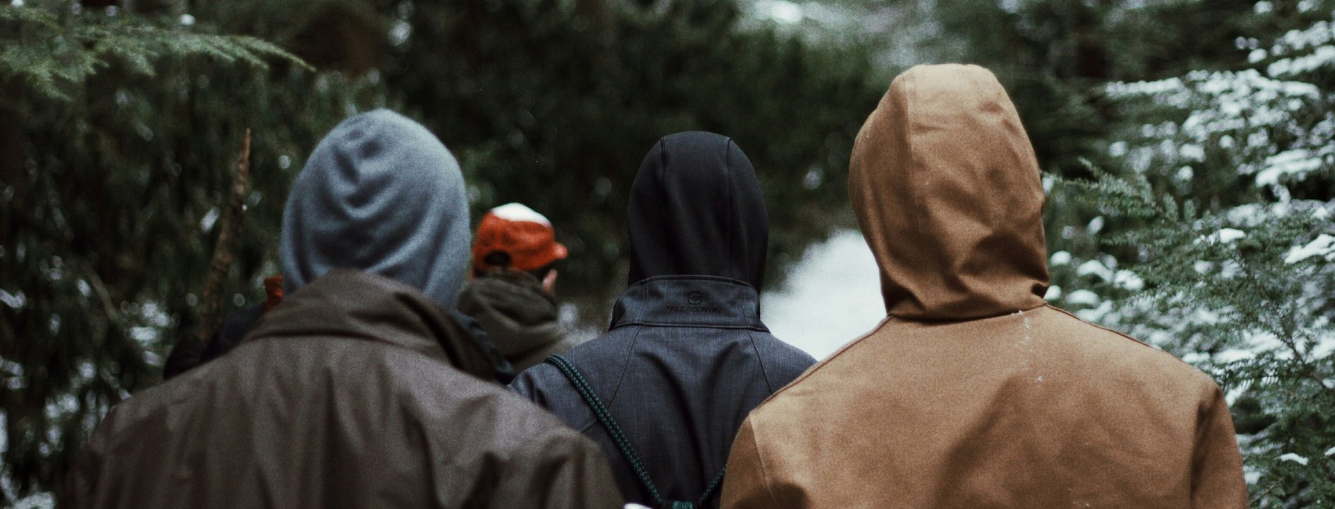 A group of people hiking up a hill