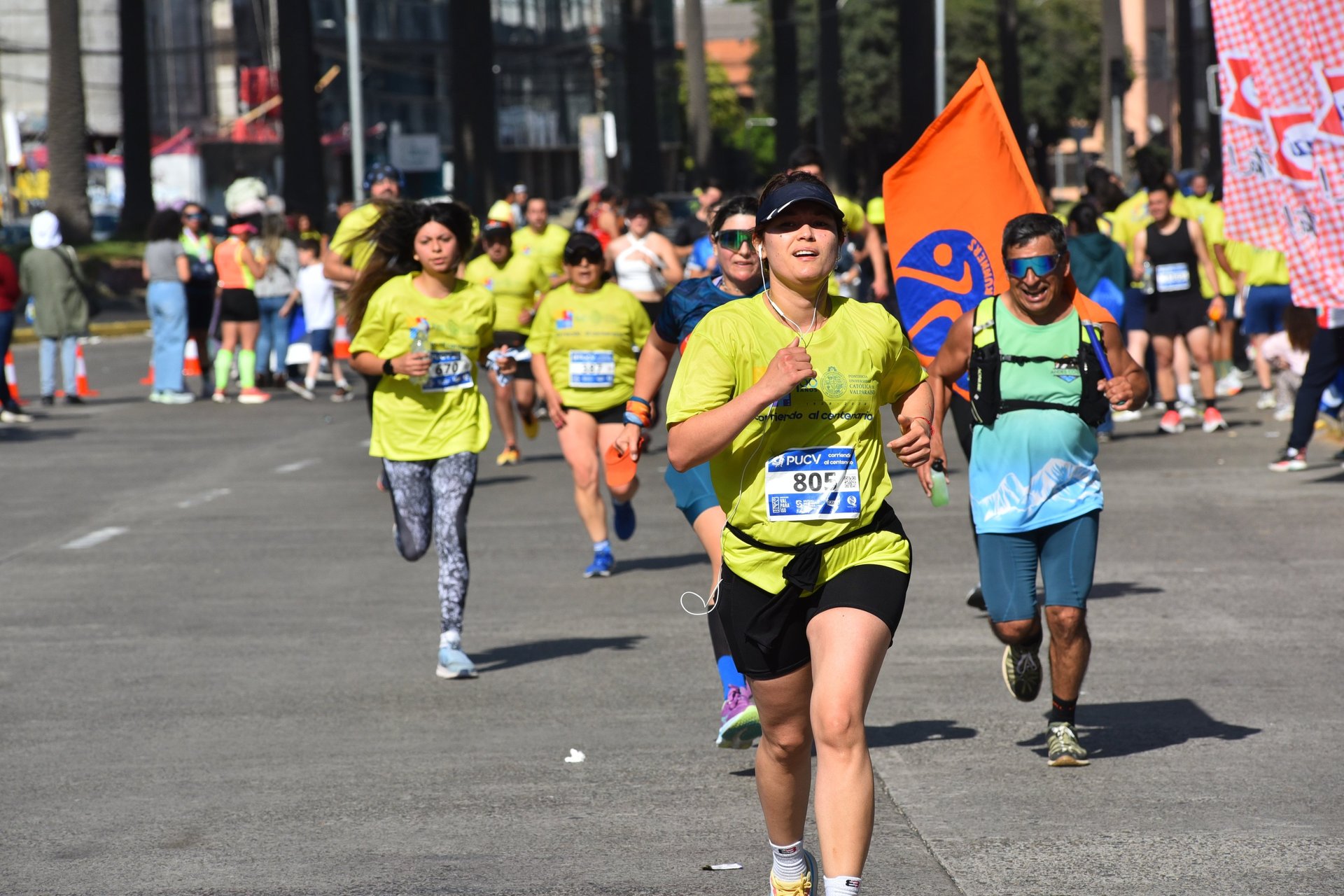 woman wearing yellow long-sleeved dress under white clouds and blue sky during daytime
