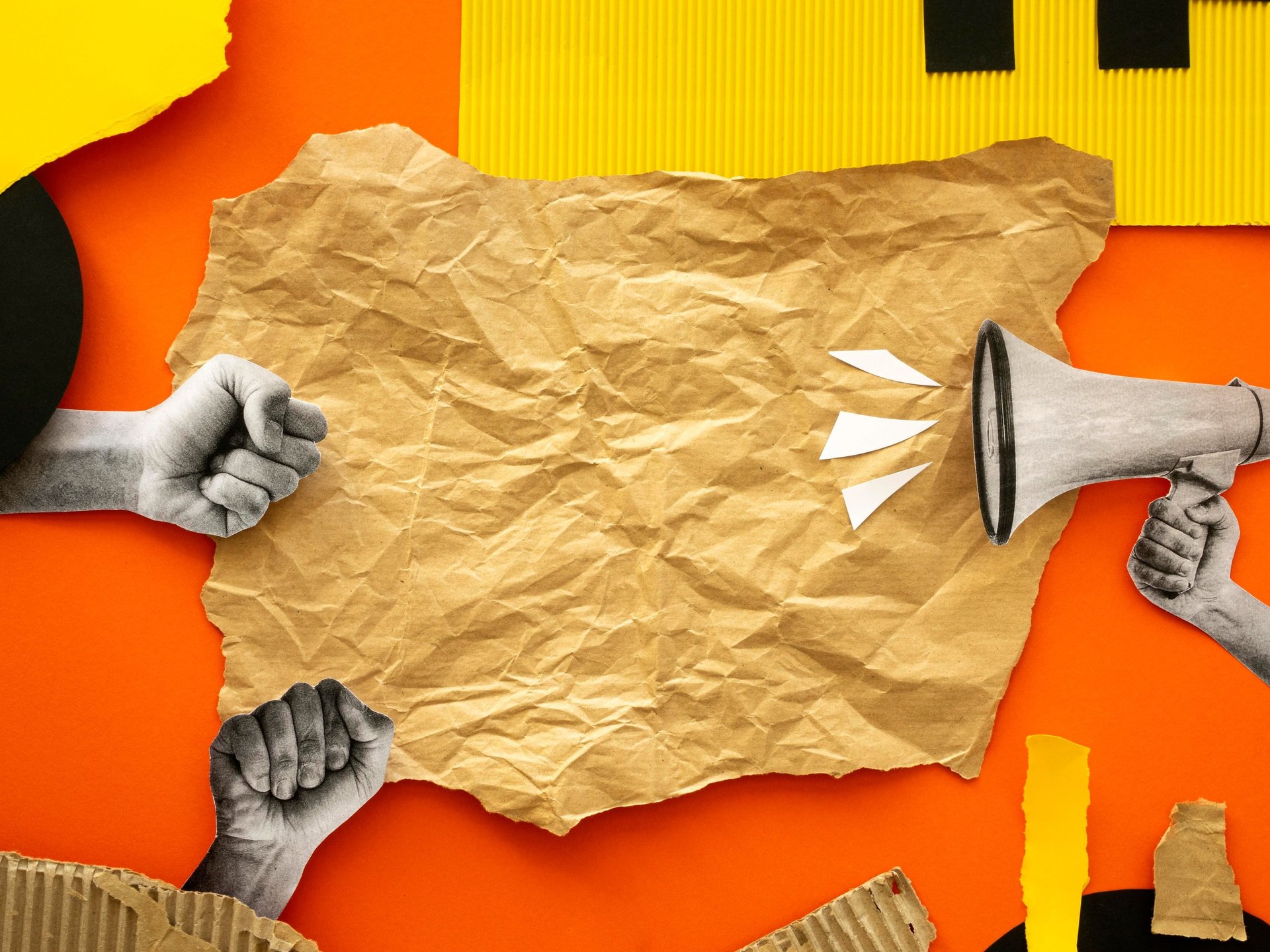 black click pen beside MacBook Pro on table