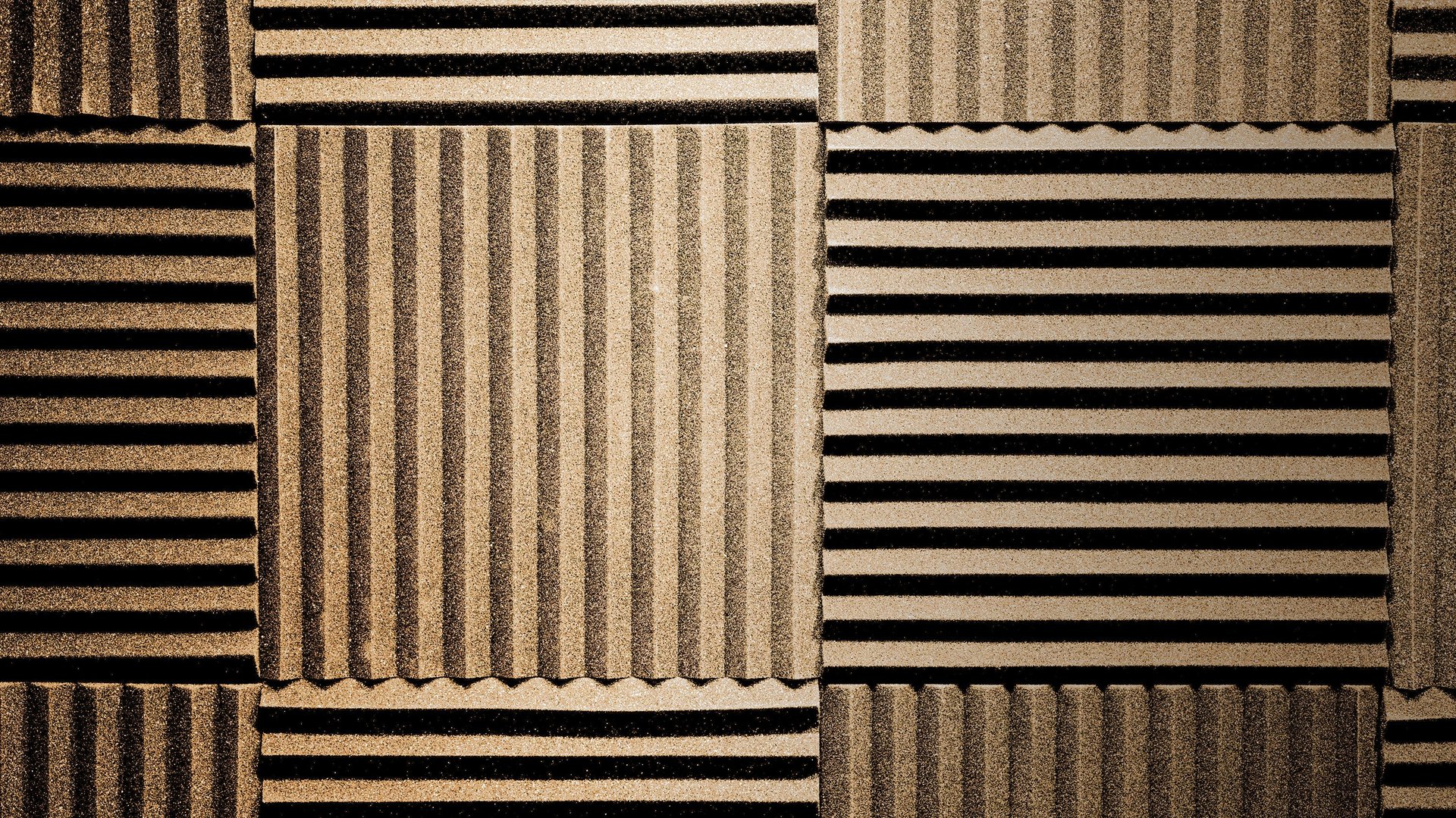a black and white photo of a wall made of corrugated