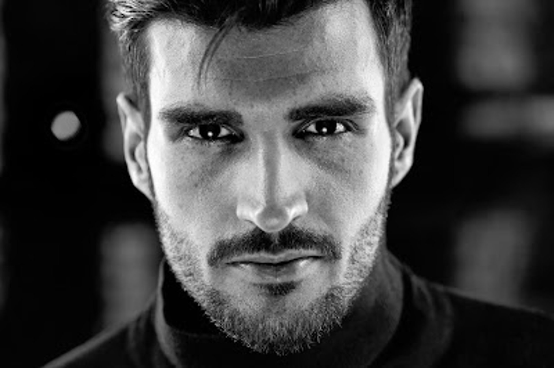 Create a visually appealing blog cover image for an article about defining the jawline. The image should feature a close-up o