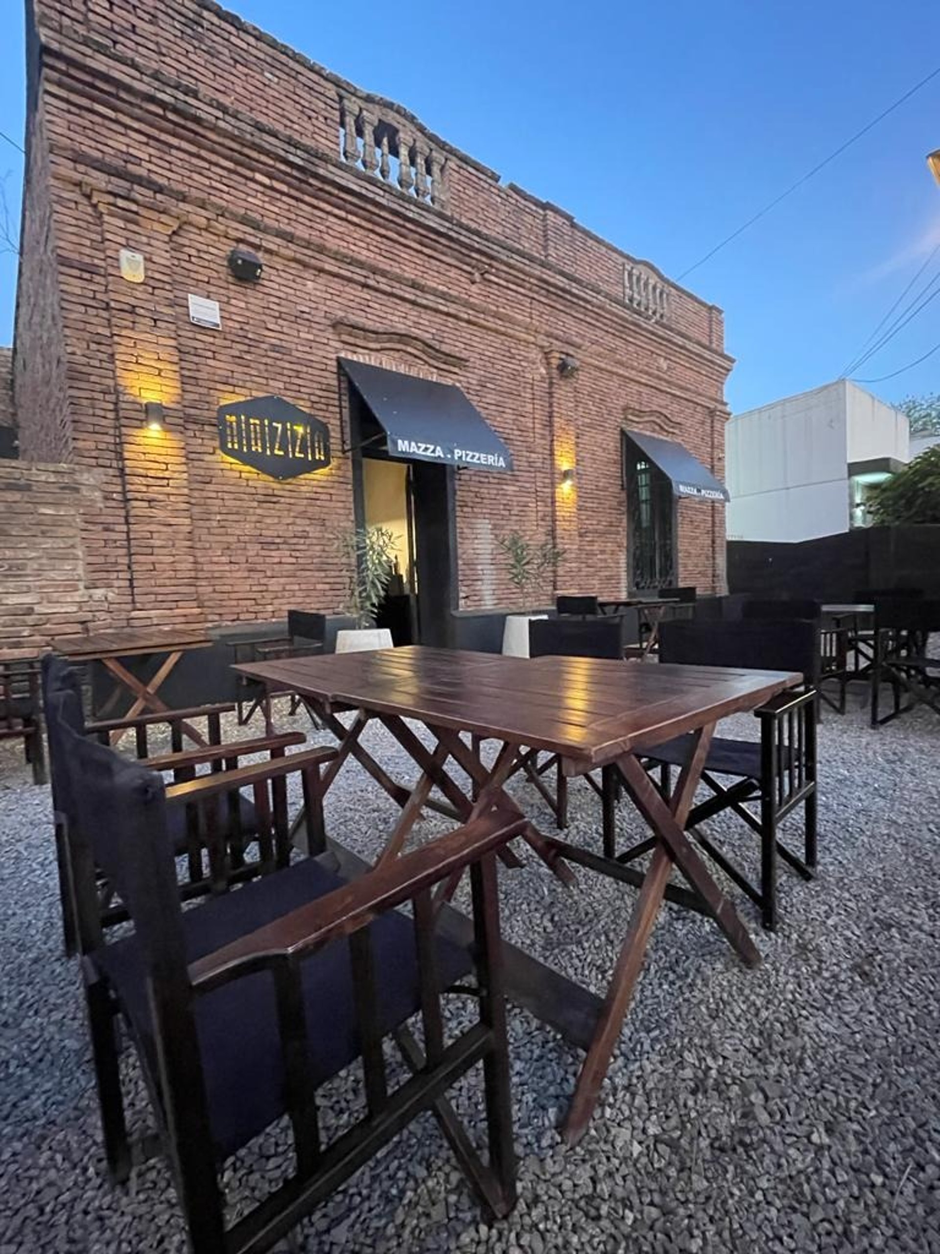 a close up of a black and brown abstract painting