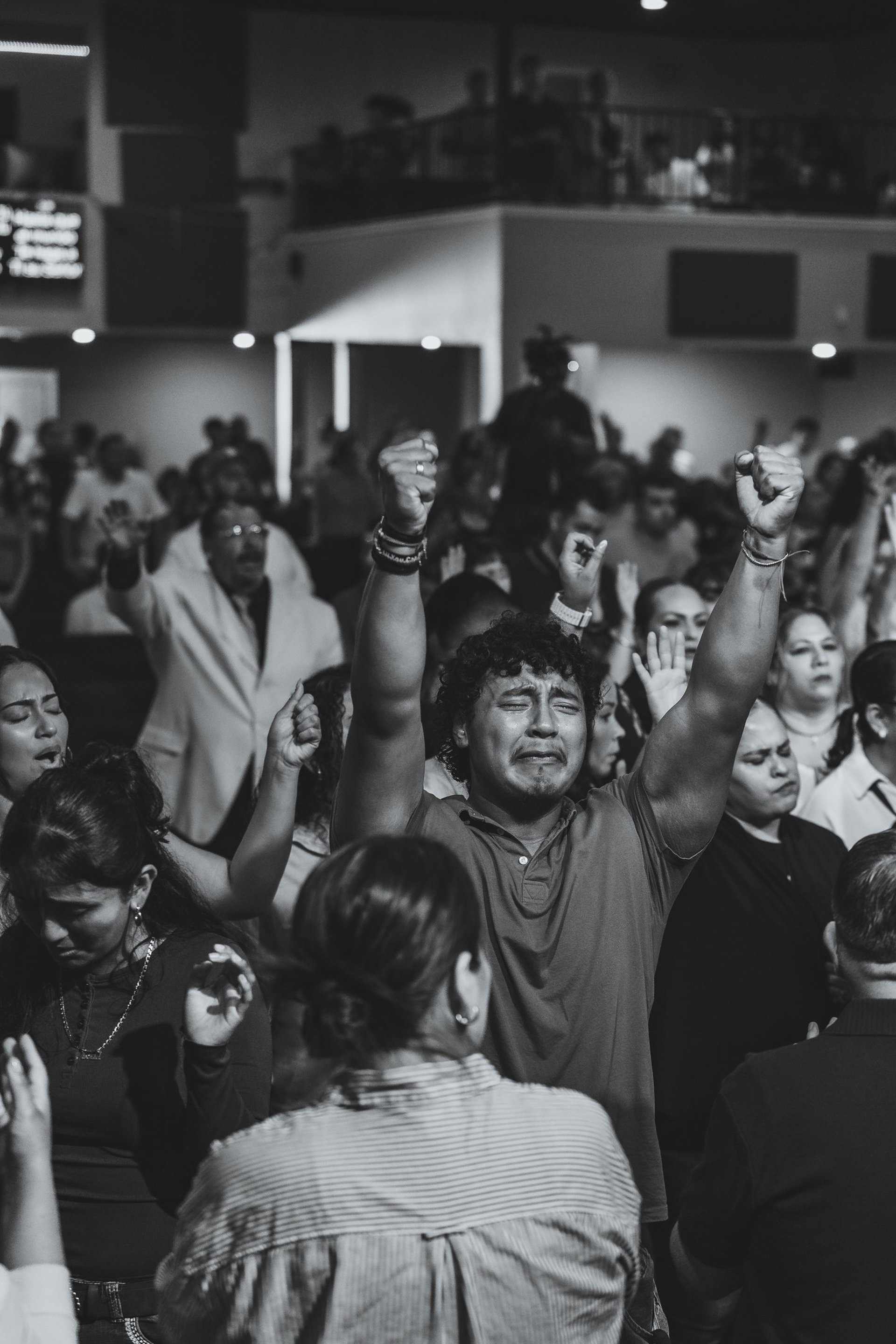 an abstract photo of a curved building with a blue sky in the background