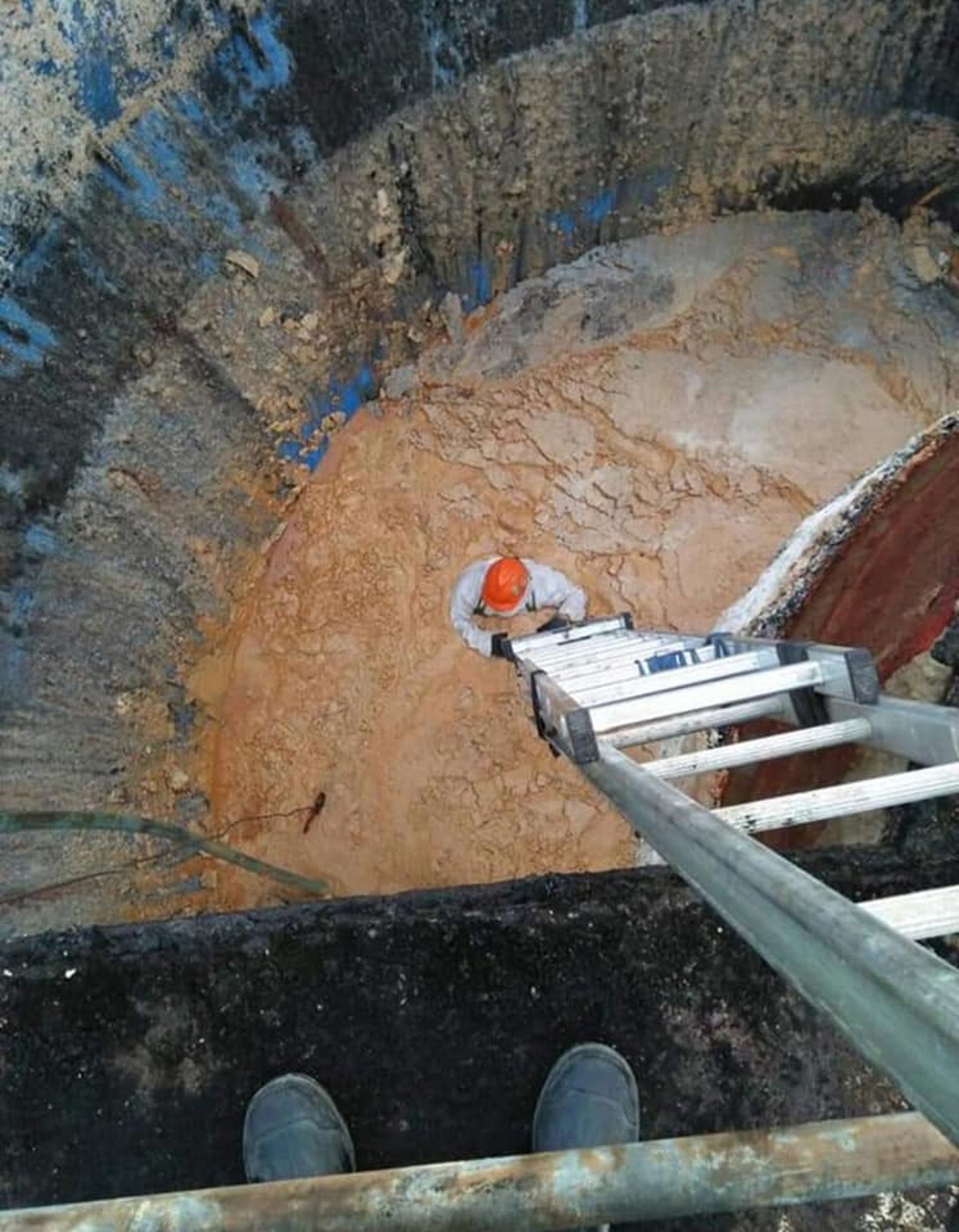 woman wearing yellow long-sleeved dress under white clouds and blue sky during daytime