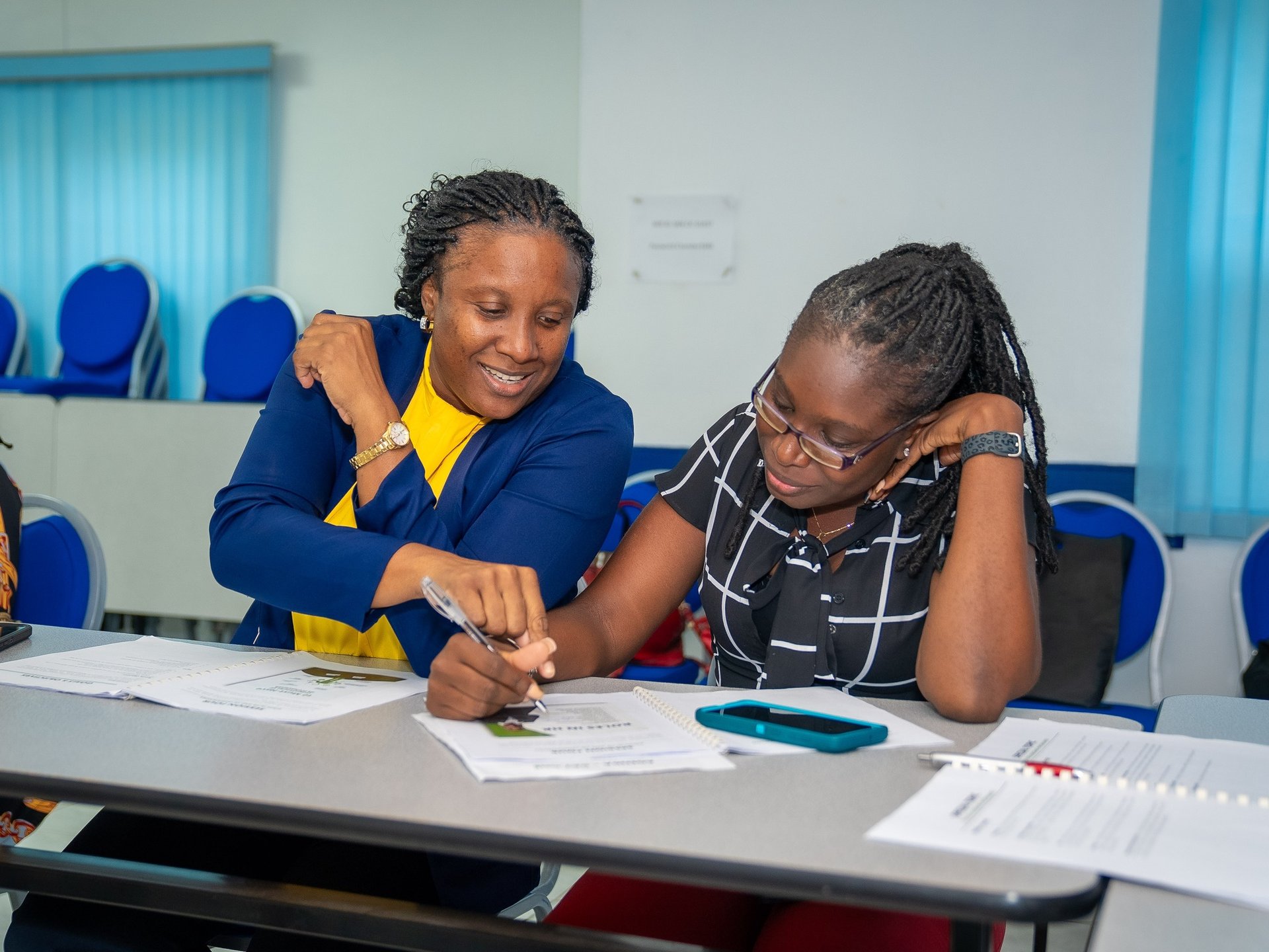 A group of people sitting around a table