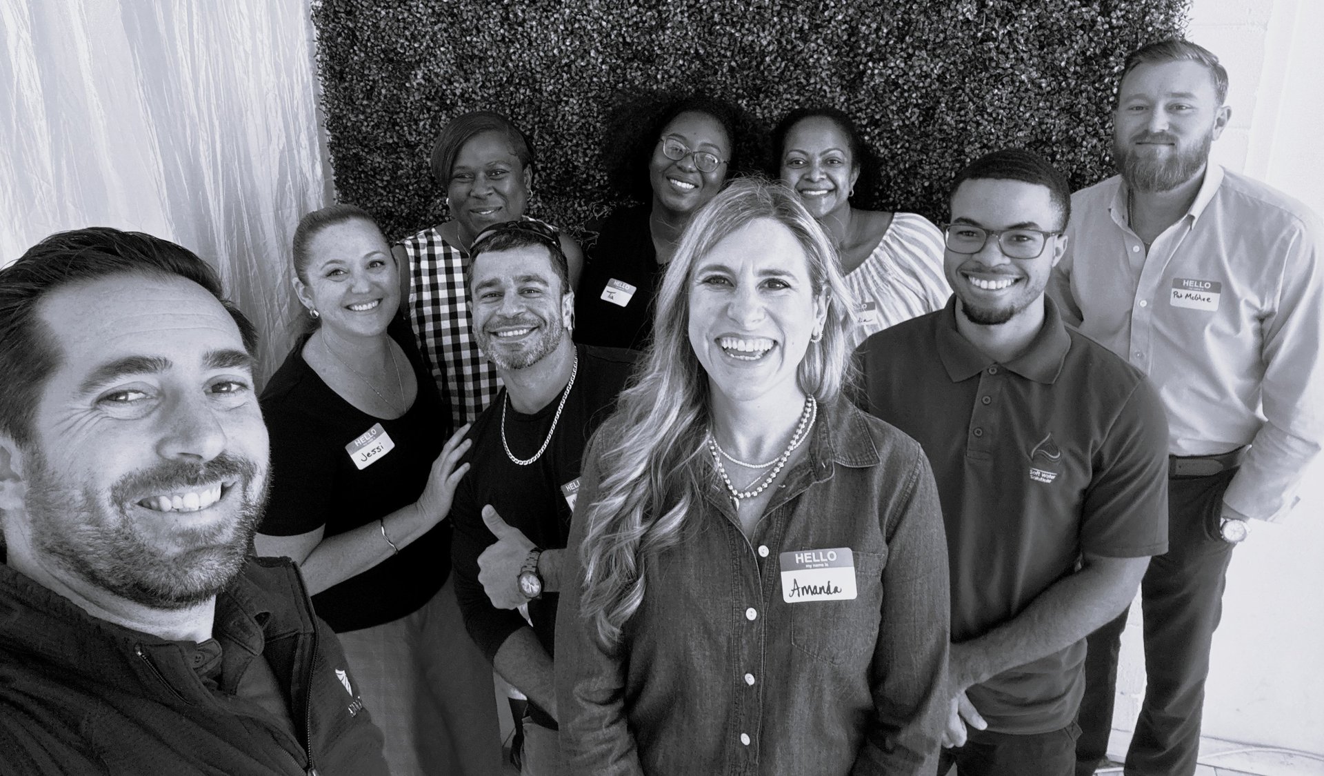 black and brown leather padded tub sofa