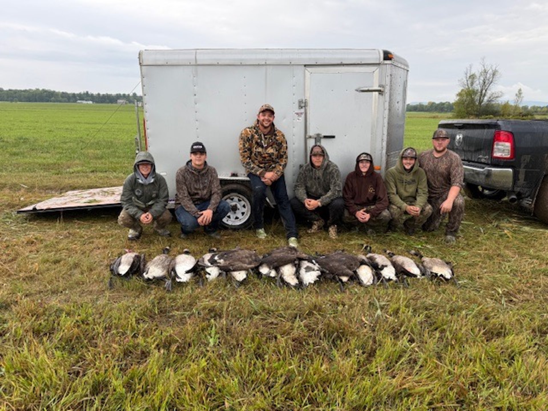 woman wearing yellow long-sleeved dress under white clouds and blue sky during daytime