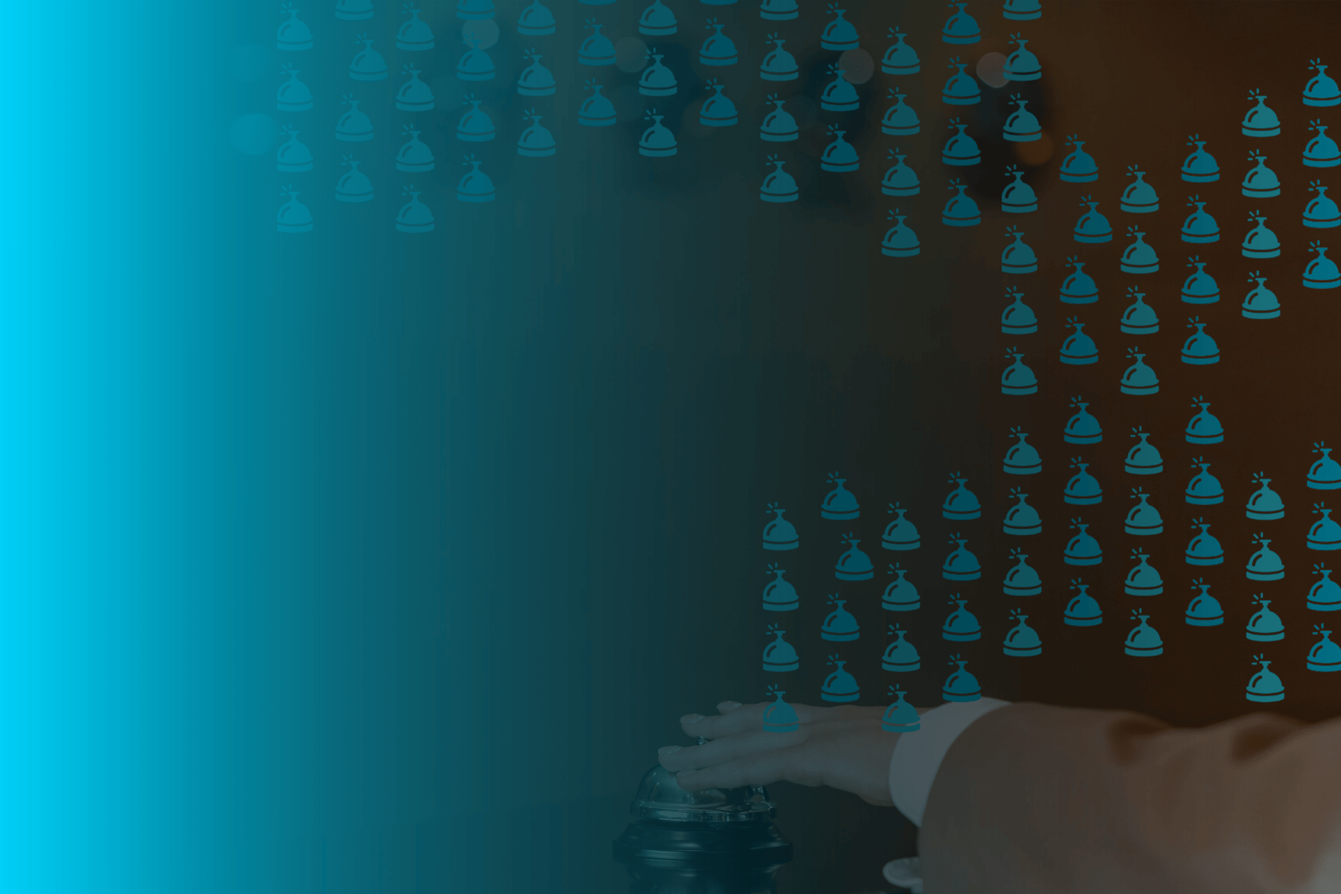 gold bell on brown wooden table