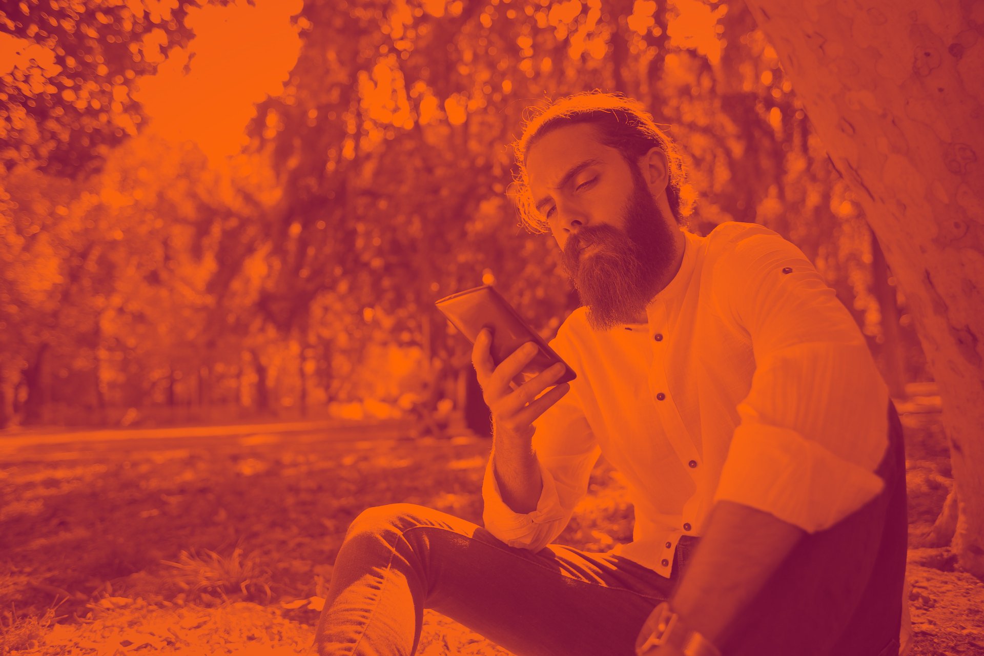 an electronic device with a blue screen on a yellow surface