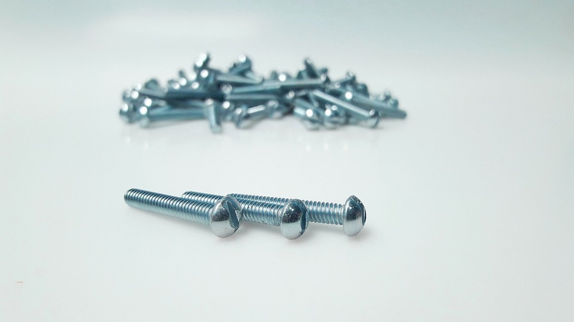 woman wearing yellow long-sleeved dress under white clouds and blue sky during daytime