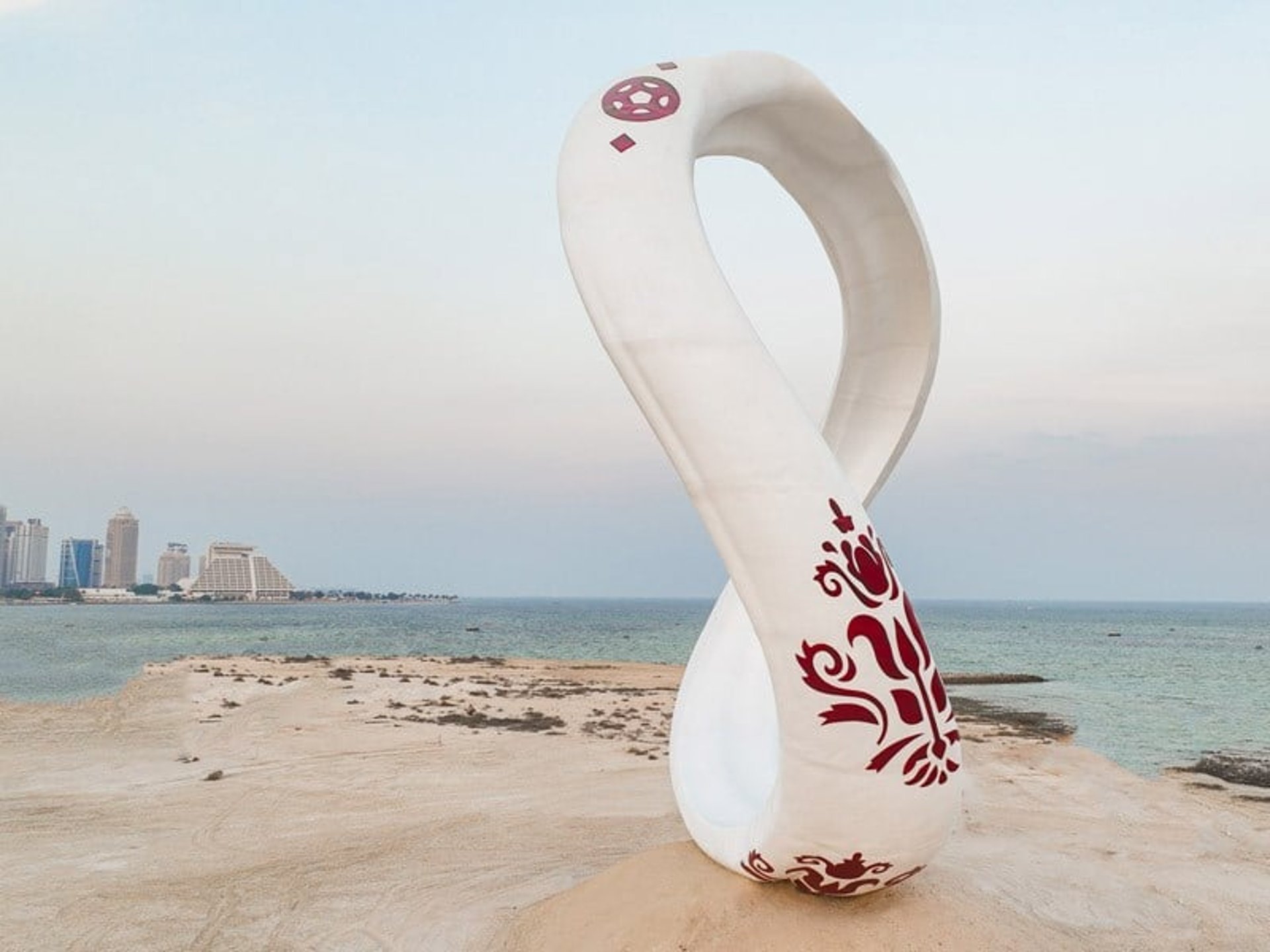 White Fiberglass Emblem Monument for FIFA World Cup Qatar 2022 Coastal Landmark in Doha by DEFARA