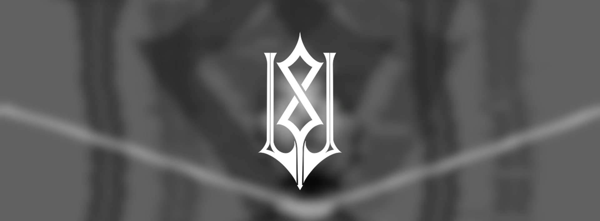 a close up of a black and brown abstract painting