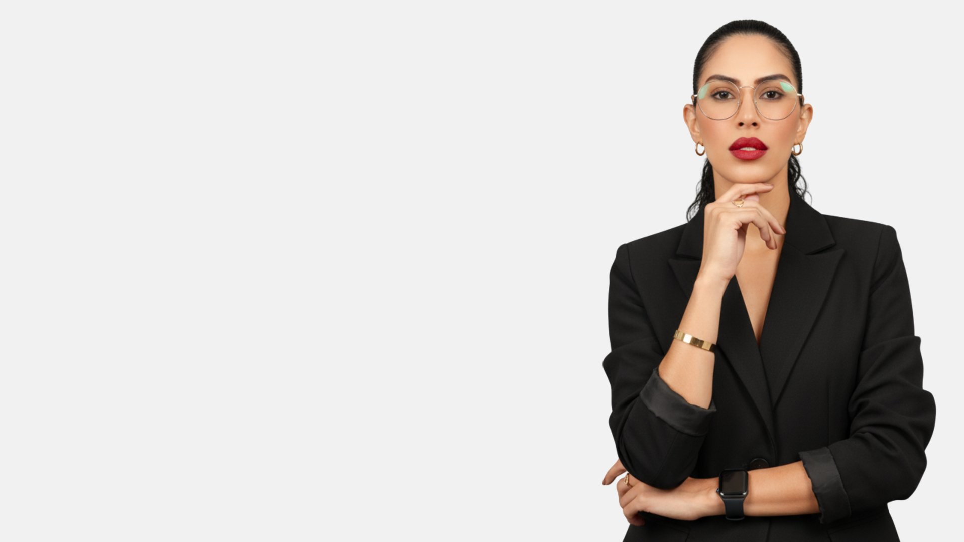 an abstract photo of a curved building with a blue sky in the background