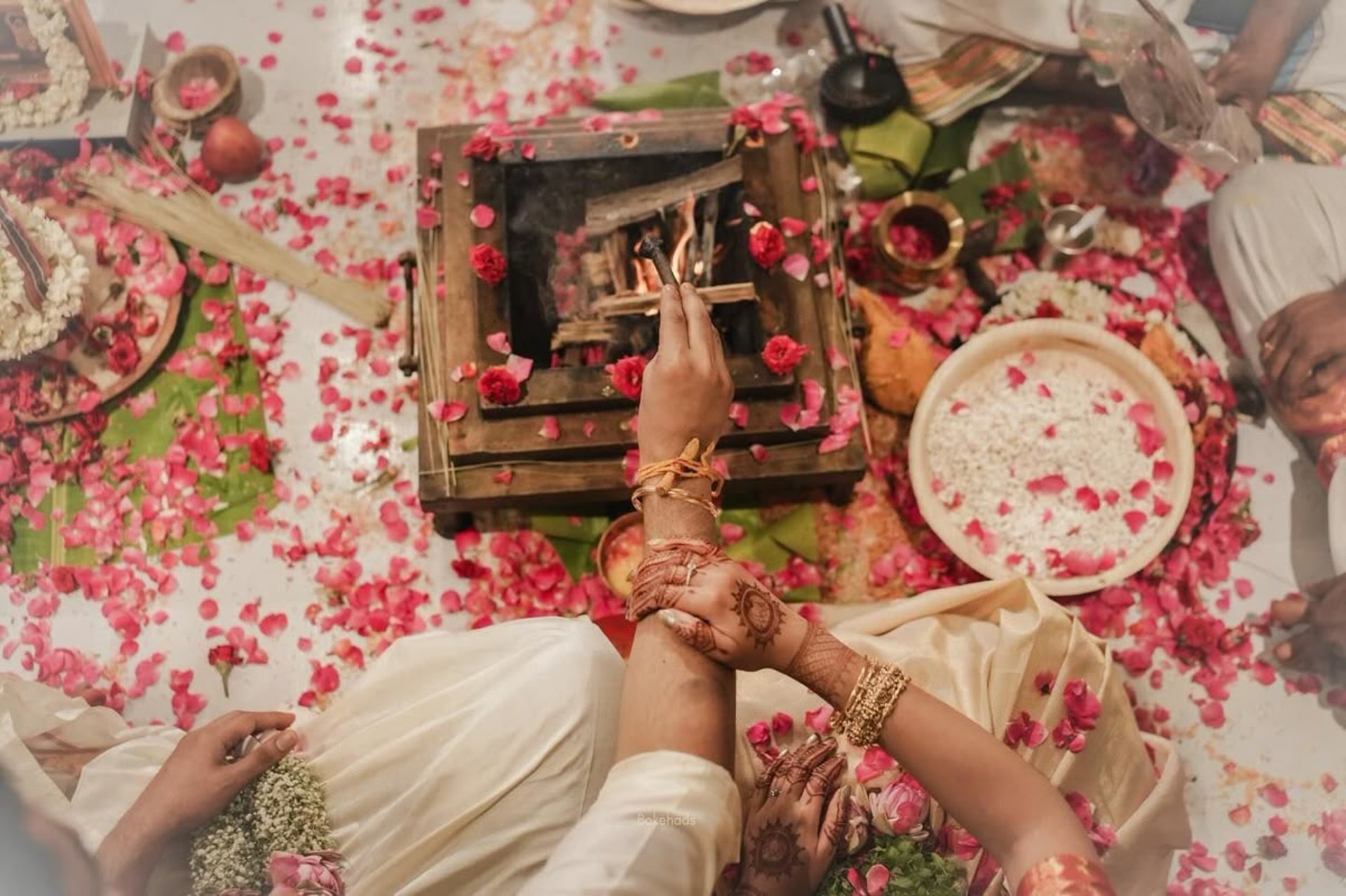couple wearing silver-colored rings