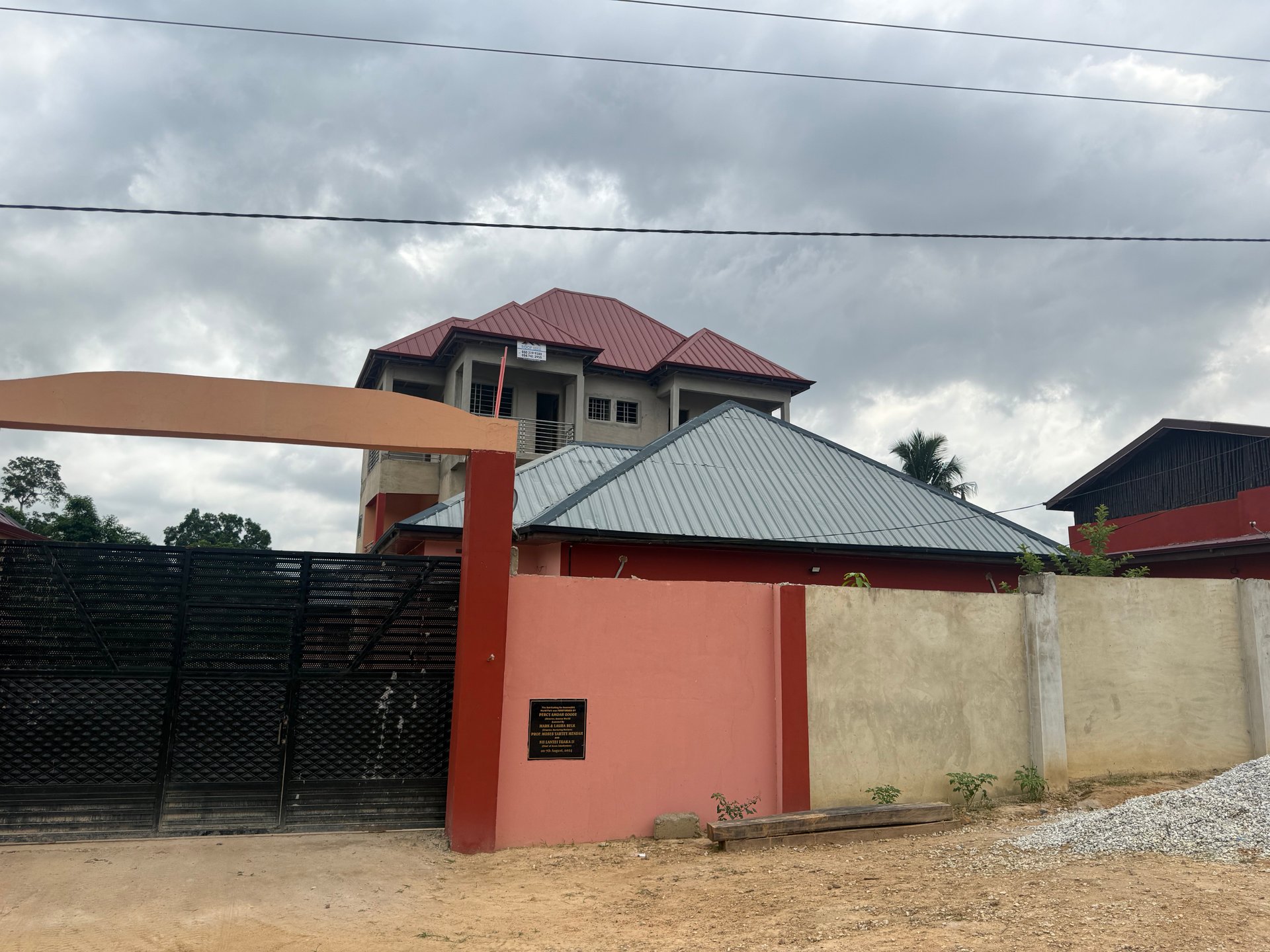 three elephants walking on grass field during day